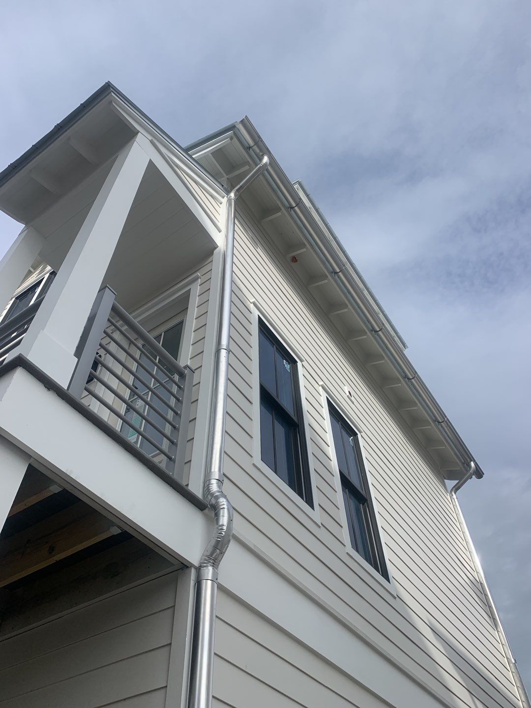 Half-Round Gutters in Galvalume Color in Santa Rosa Beach FL by Gutter Professors