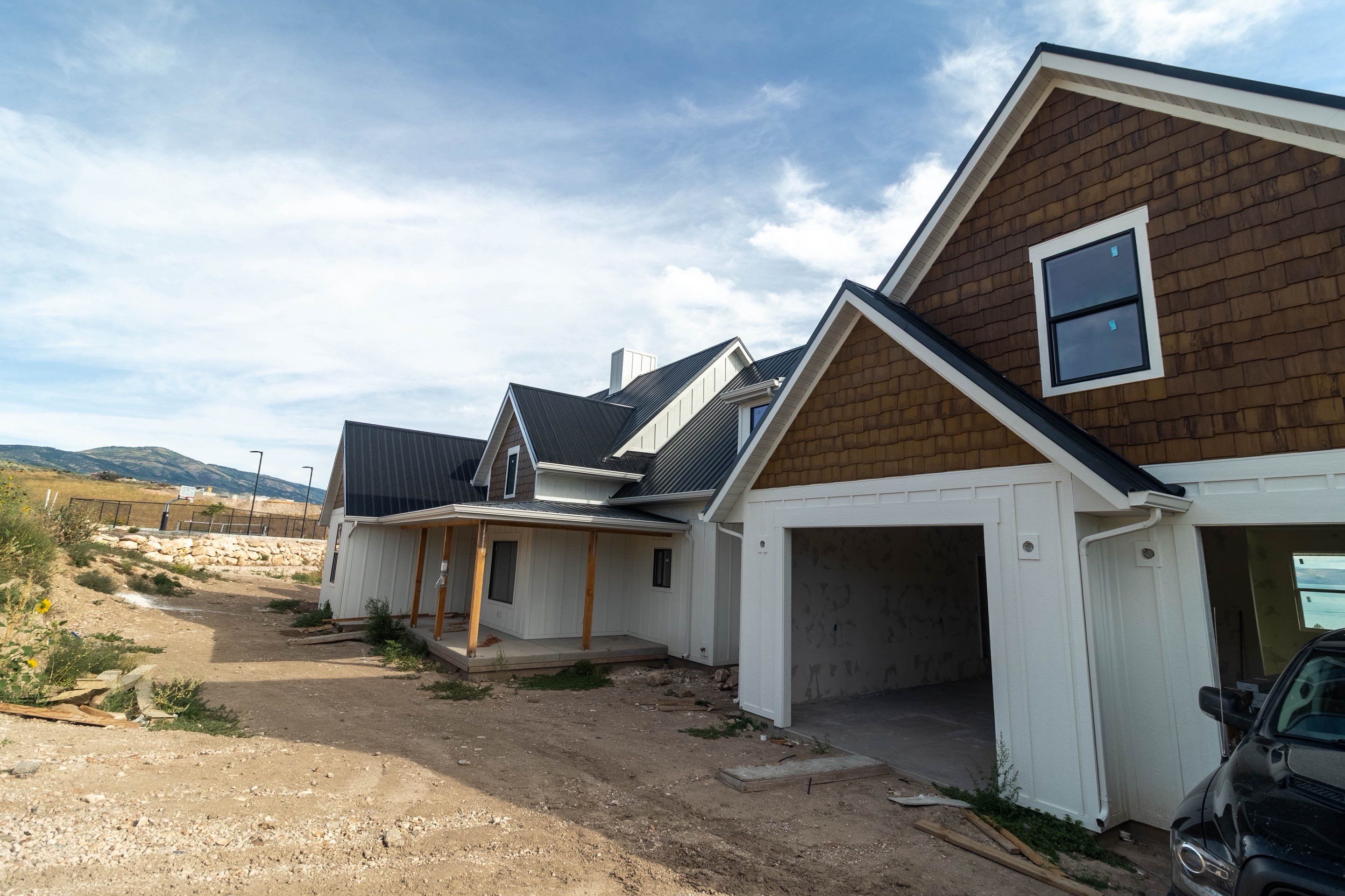 LP SmartSide Siding and Metal Roofing Installation in Garden City by Garner Construction