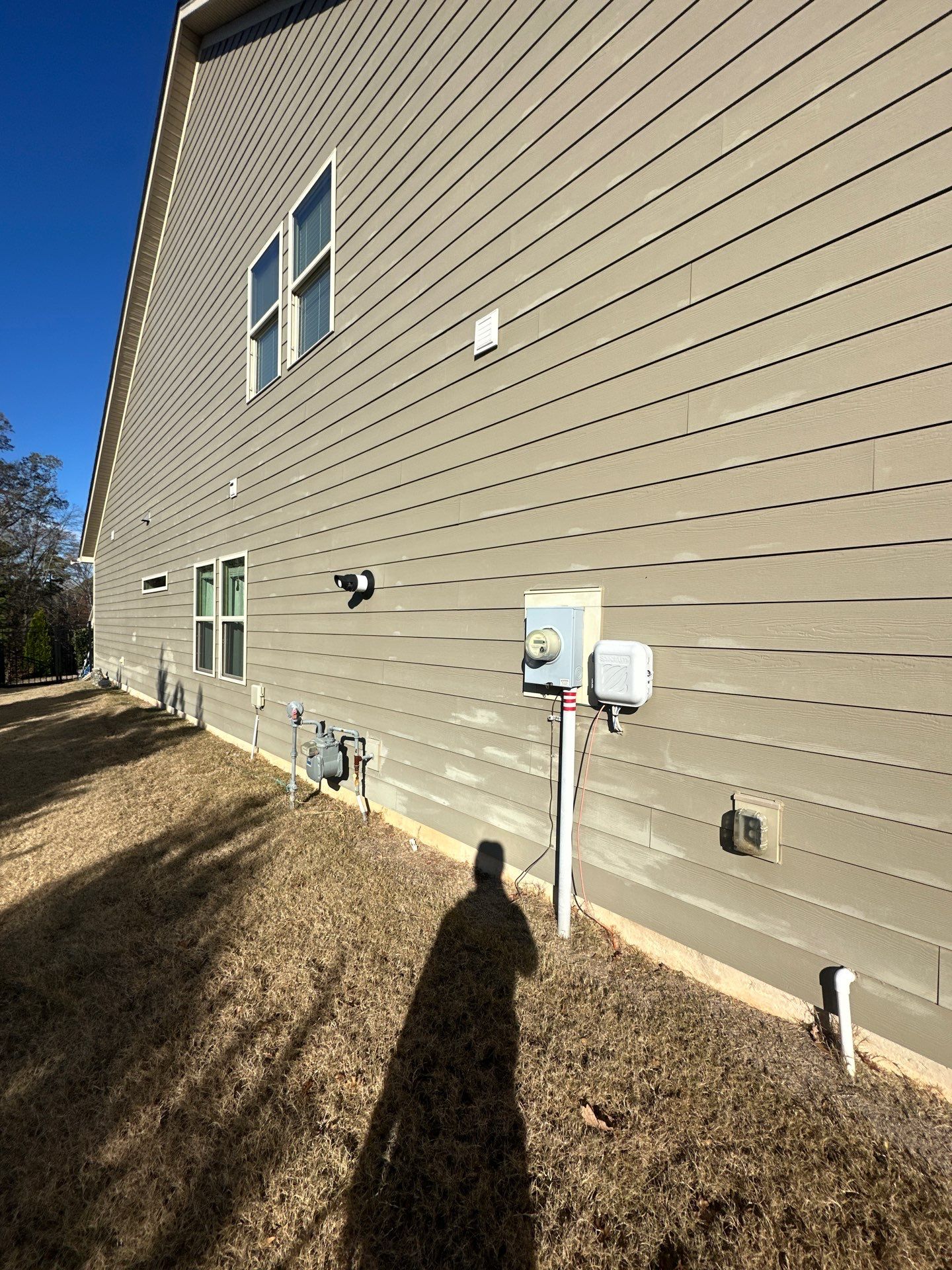 cleaning the exterior siding of a house removing dirt and grime for a fresh appearance