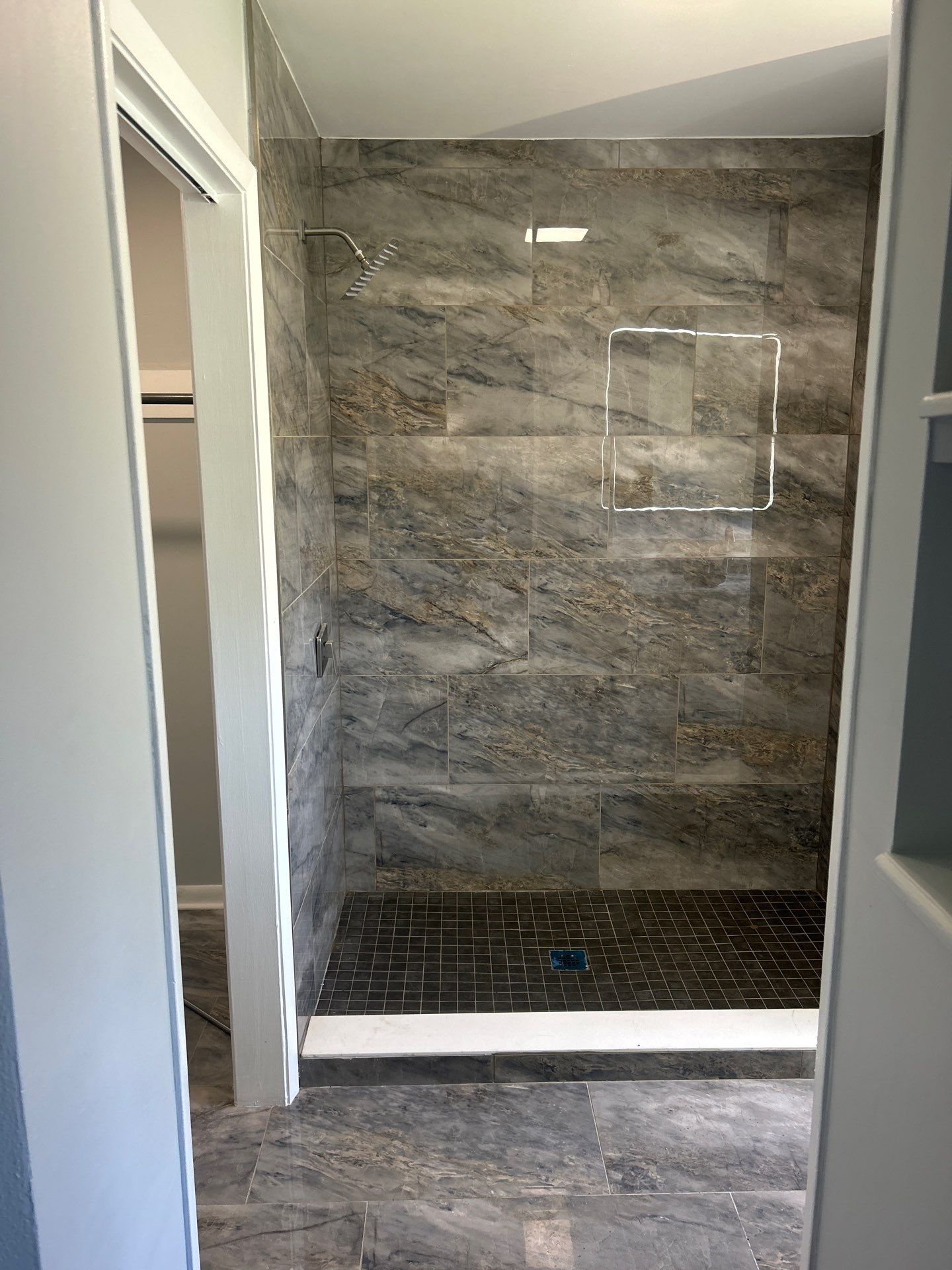 Luxury Bathroom Makeover: Walk-in Shower & Saloon Doors Renovation by urban green energy llc