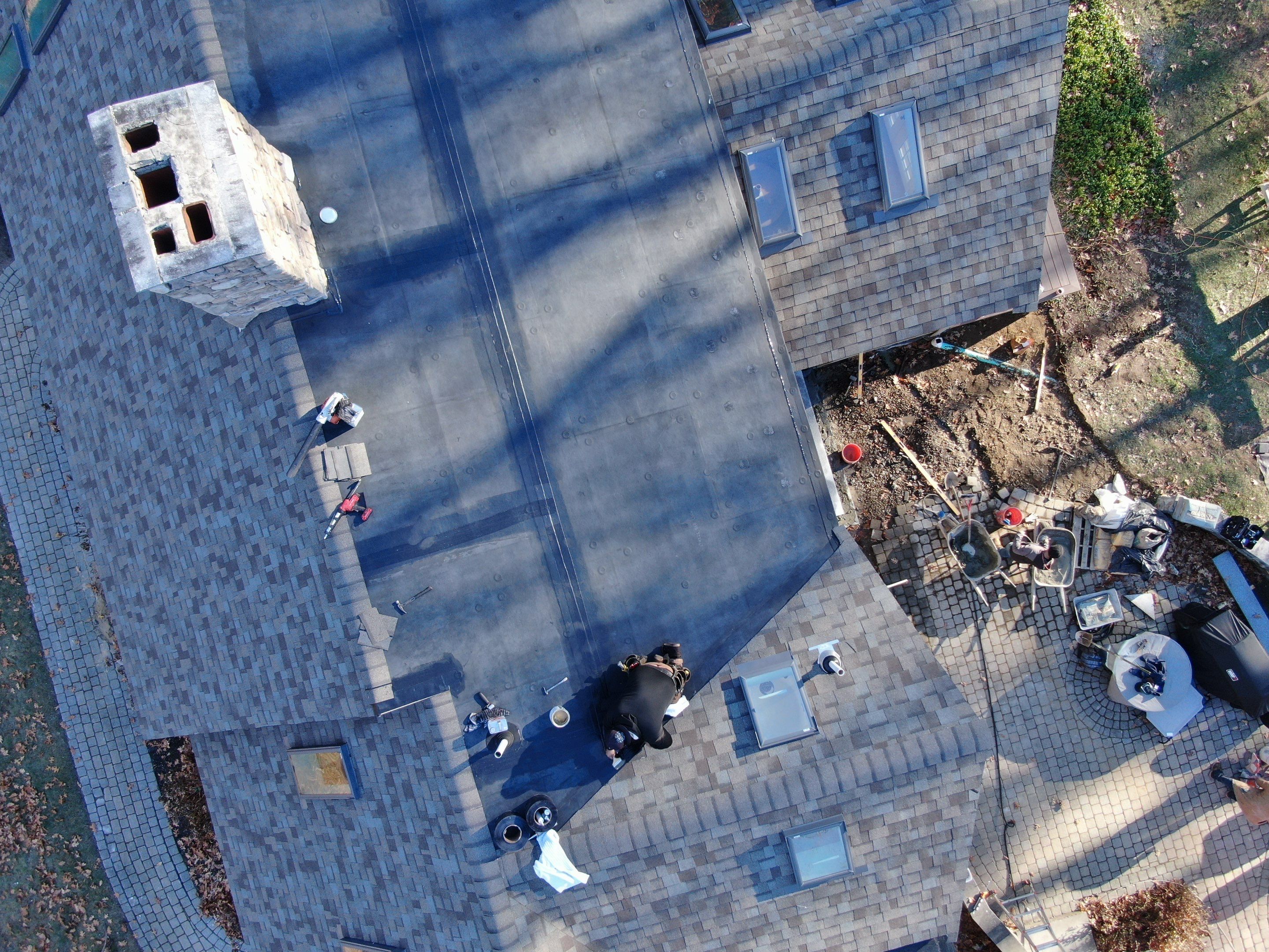Complete House & Barn Roof with 13 Skylight Reflashing + EPDM Repairs by Mighty Dog Roofing of Greater Middlesex County