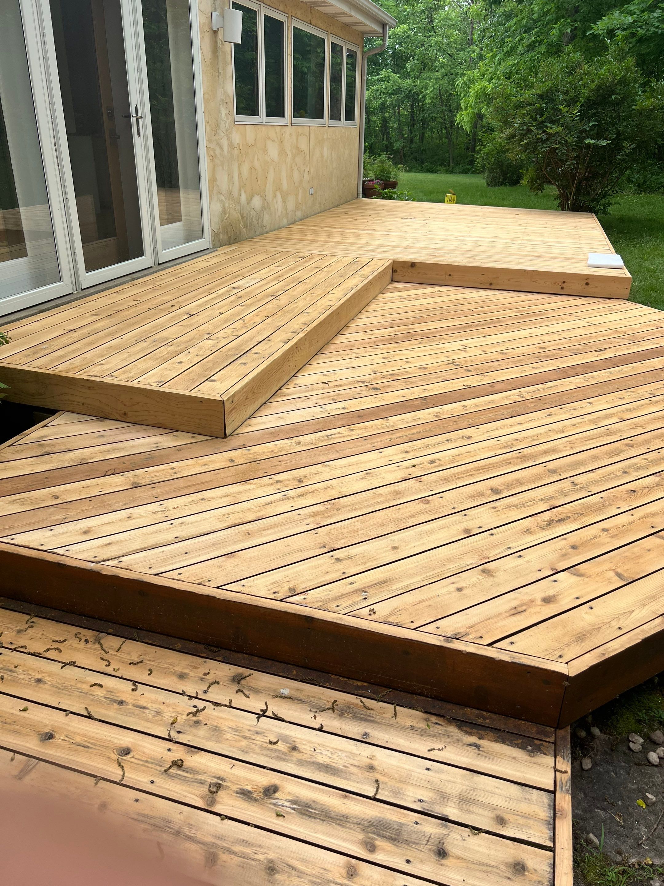 Multi-Level Wood Deck Restoration and Refinishing in Muskego by OCS Contracting Services