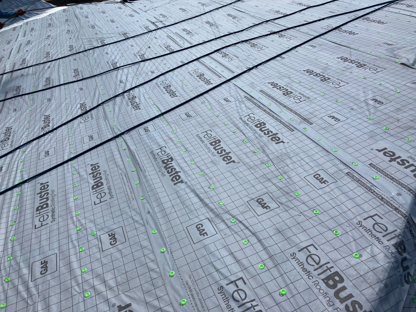 Residential Roofing Installation using Roof Replacement by American Roofing & Construction LLC