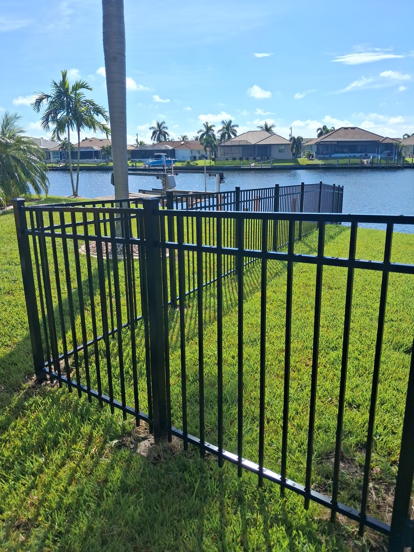 Custom Black Aluminum Fence Enclosure for Punta Gorda Waterfront Property by True Fence LLC