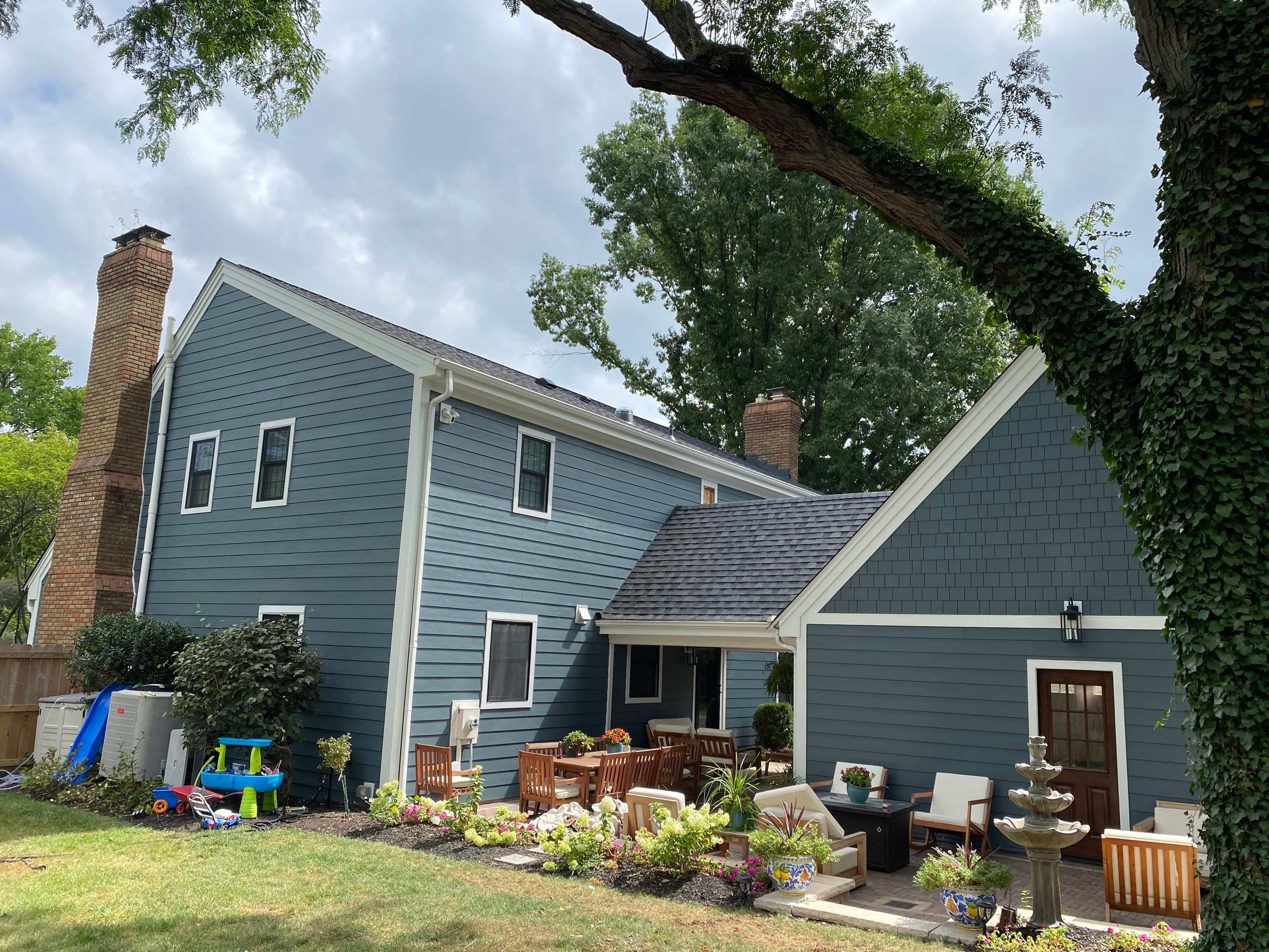 Residential Roofing Installation using James Hardie Fiber Cement Lap Siding and Certainteed Landmark Pro Shingles by Best Exteriors Inc