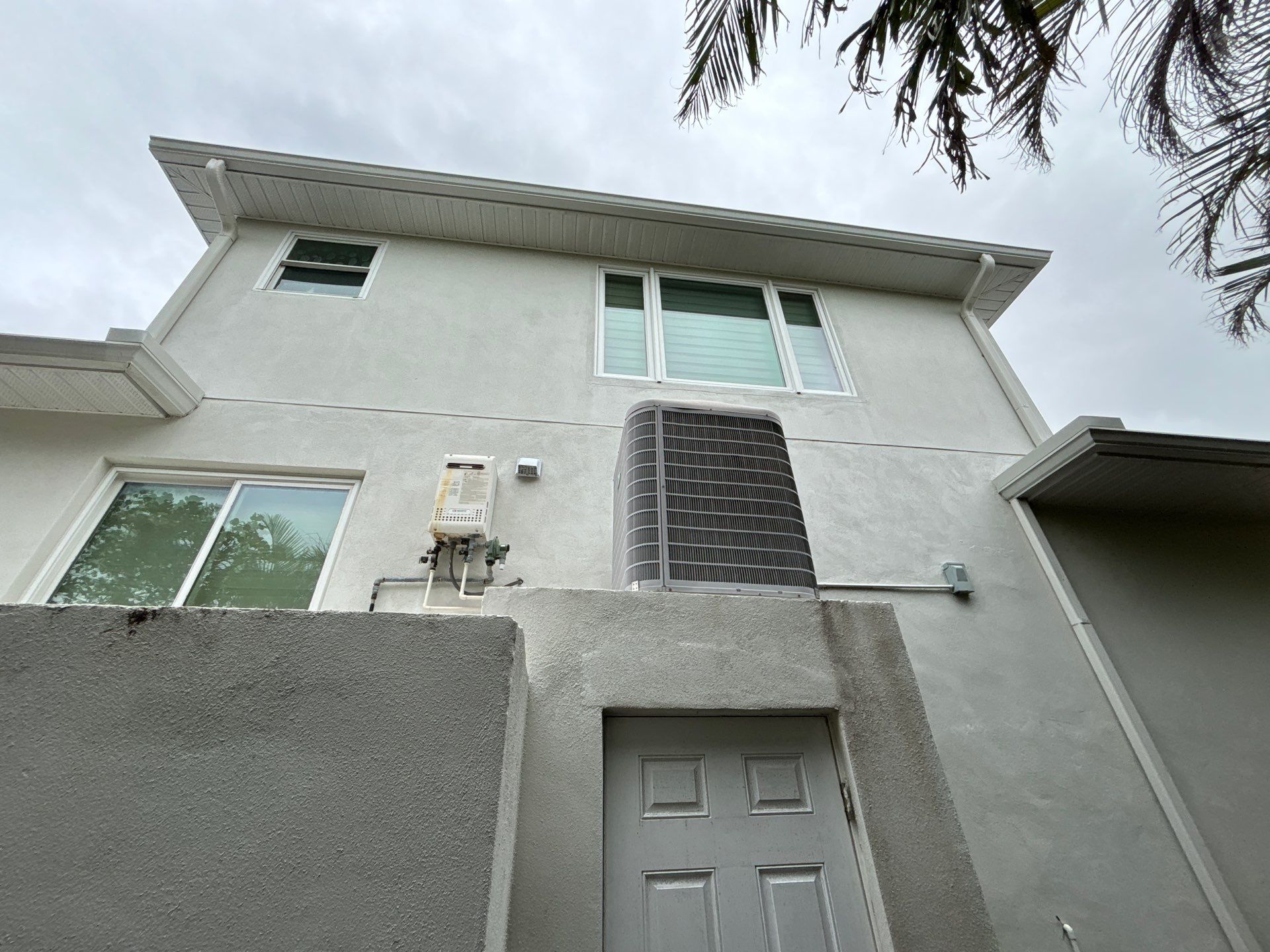 6-Inch White Seamless Gutters Installation in Siesta Key FL by Gutter Professors