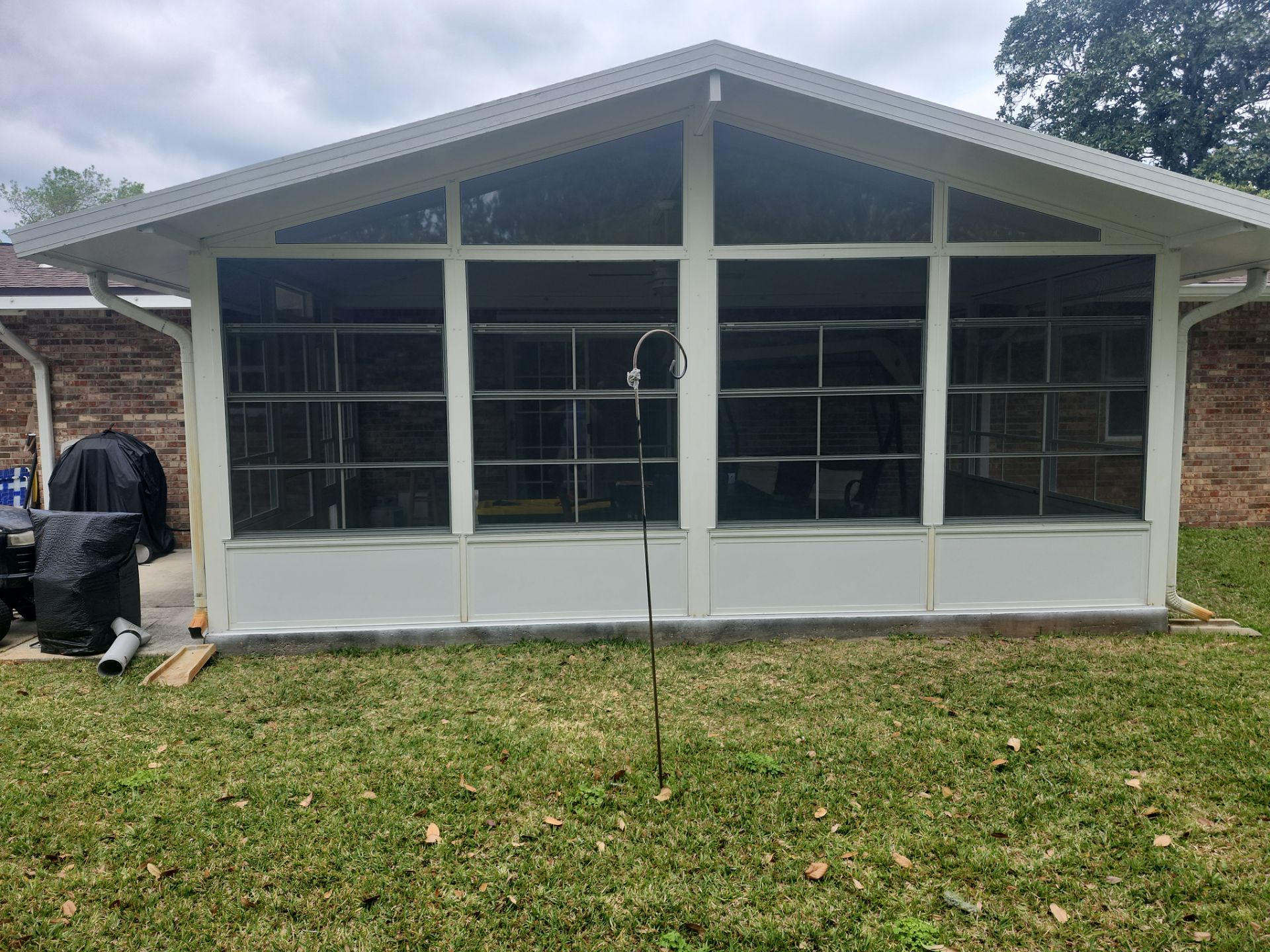 Enclosure with Vinyl Windows using Colorbeam by Titan Sunrooms