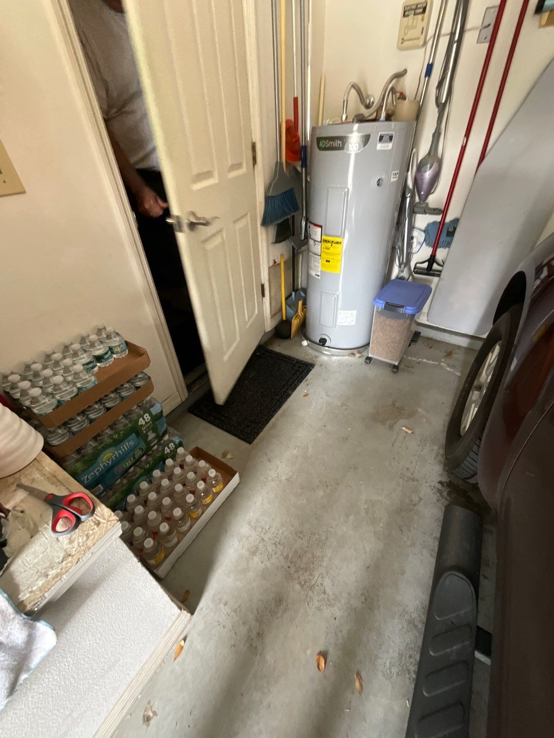 Driveway and Garage using Tidal Wave by Amvet concrete coatings llc
