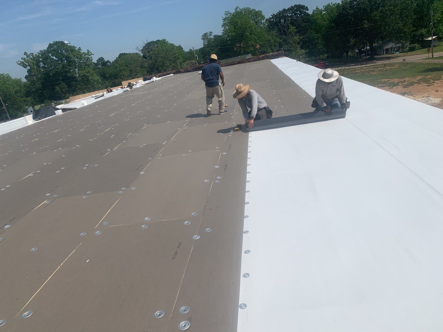 Commercial Roofing Installation using 50 mil PVC by Hostetler Roofing