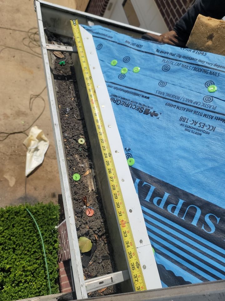 Residential Roofing Installation using Roof Replacement by American Roofing & Construction LLC