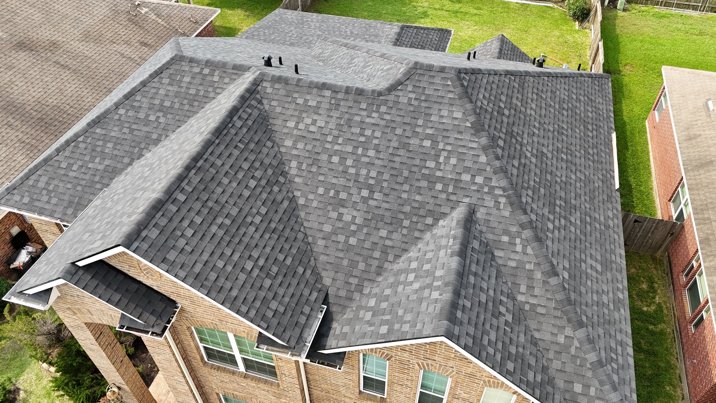 Residential Roofing Installation using IKO Dynasty by Core Four Roofing