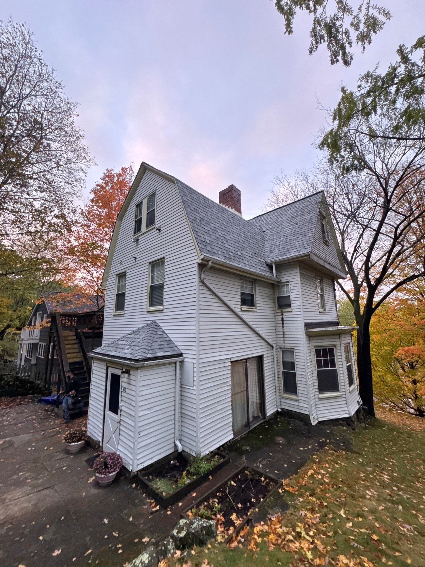 Full Roof & Porch EPDM Replacement with Skylight and Chimney Repairs by Mighty Dog Roofing of Greater Middlesex County