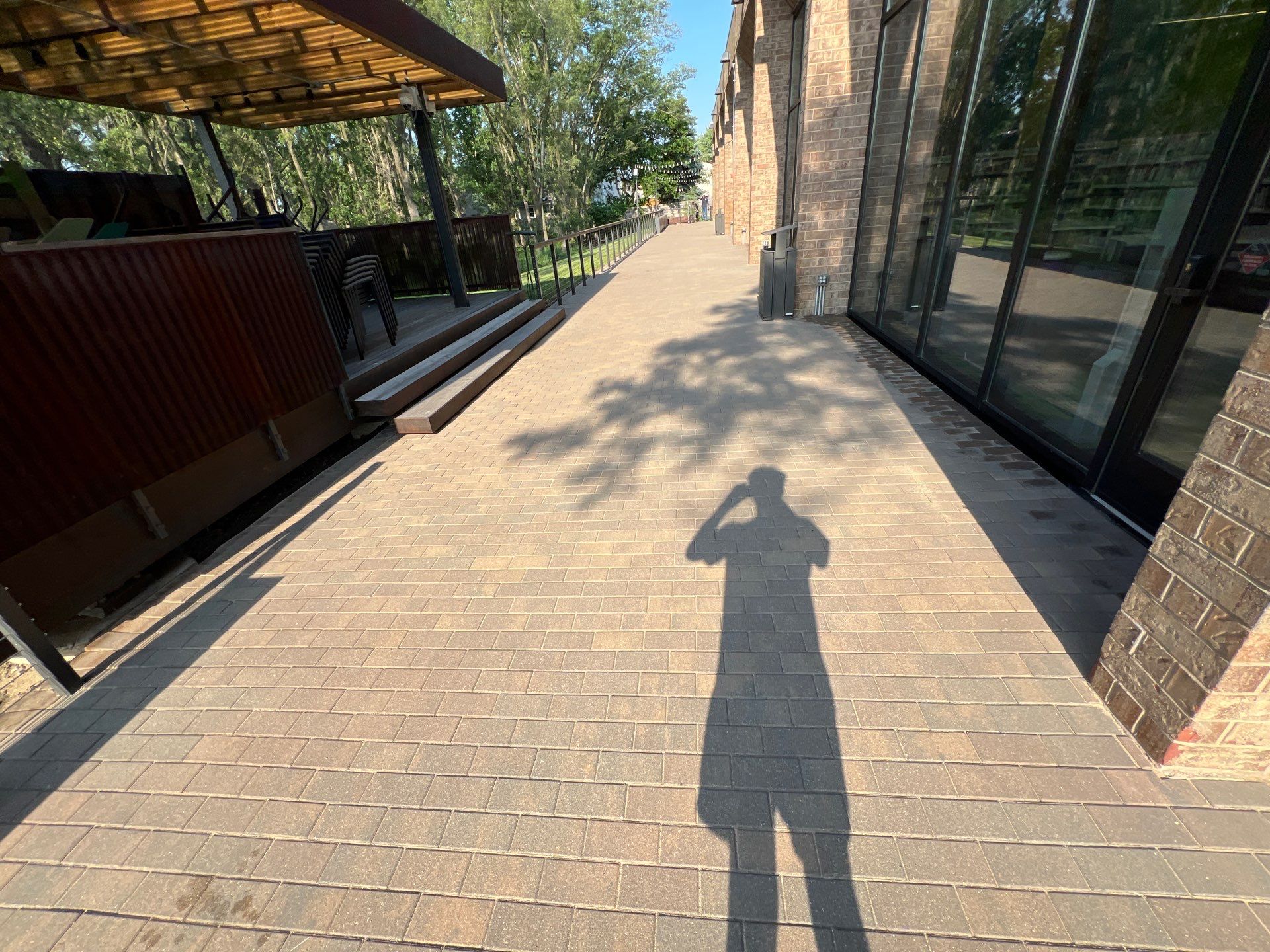 Brick paver repair, cleaning, sealing and poly sanding by Northern Power Washing LLC.