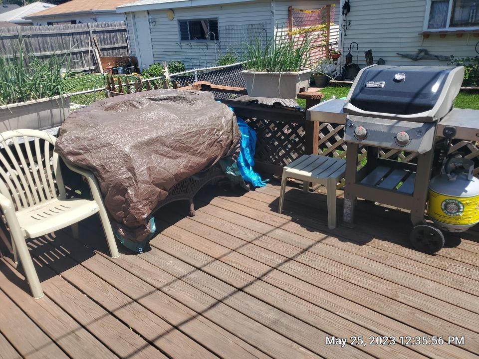 Wood cleaning and staining using Armstrong cloark oil stain by Northern Power Washing LLC.