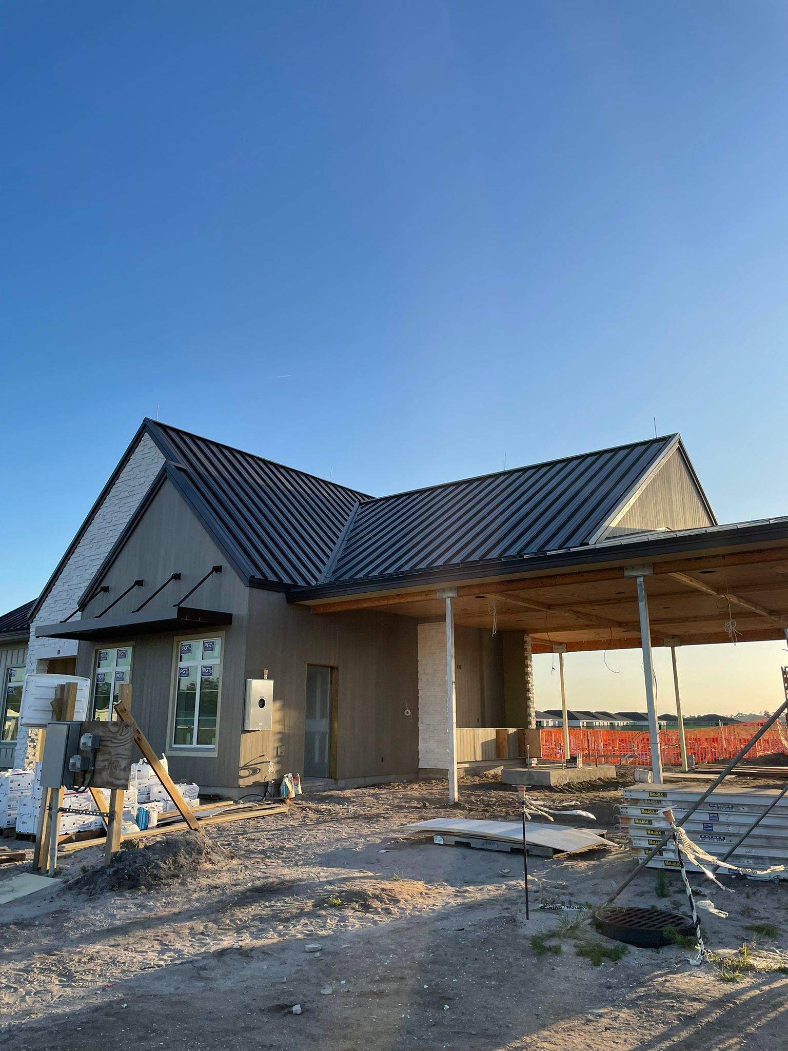 24ga 1.5" Snap-Lock Dark Bronze by Total Roofing System The Metal Roof Experts