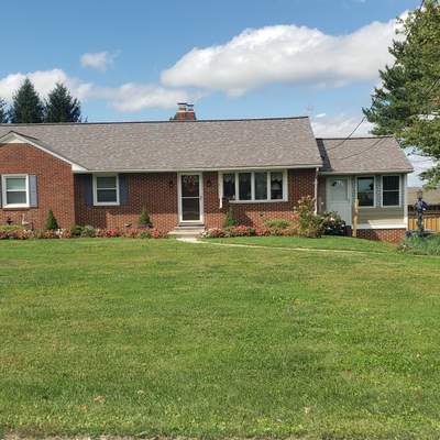 Residential Roofing Installation using Owen's Corning Colonial slate. 