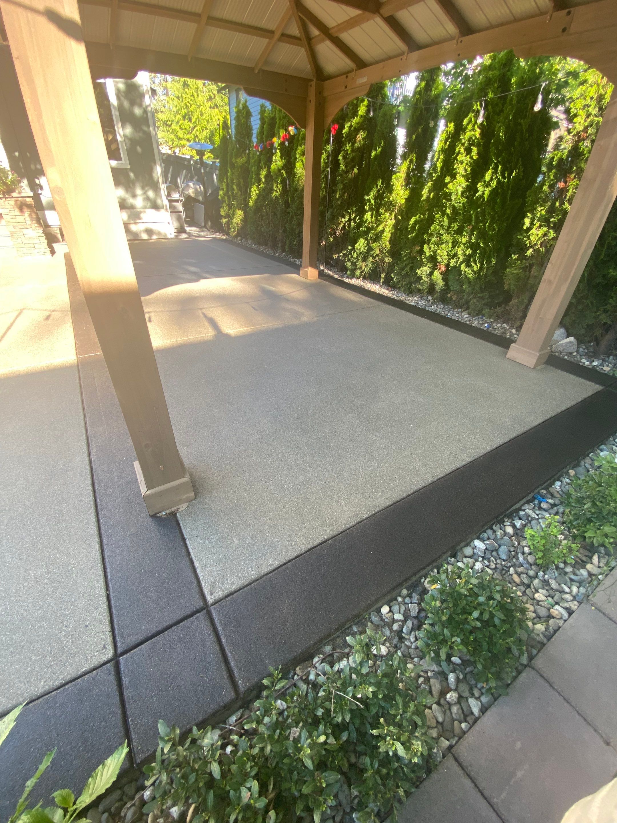 Patio Installation using Concrete, Retaining walls, and Turf install by Jireh Asphalt & Concrete Inc 