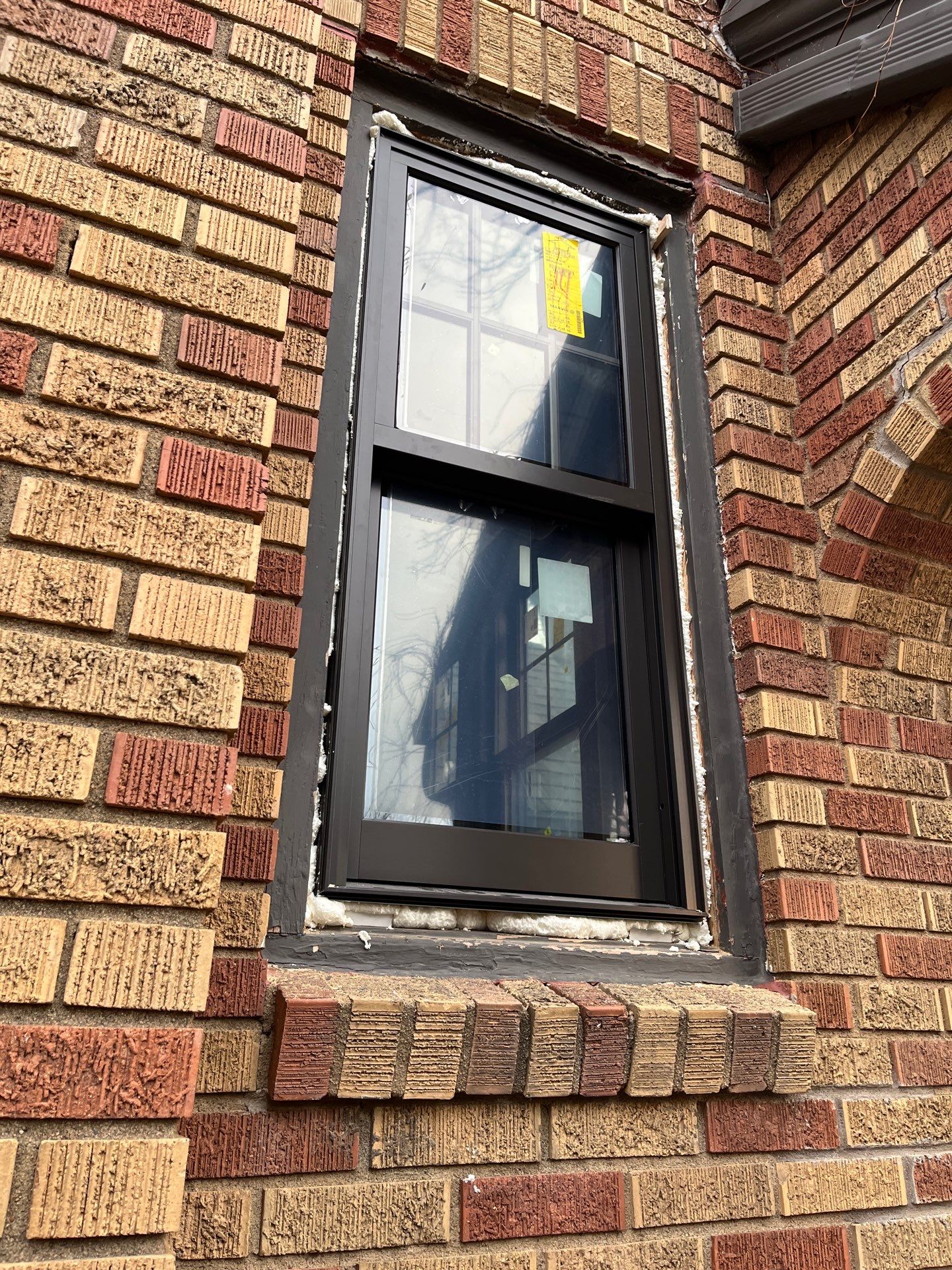 Dark Bronze Exterior Window Replacement Project in Omaha by Carps Complete Exteriors