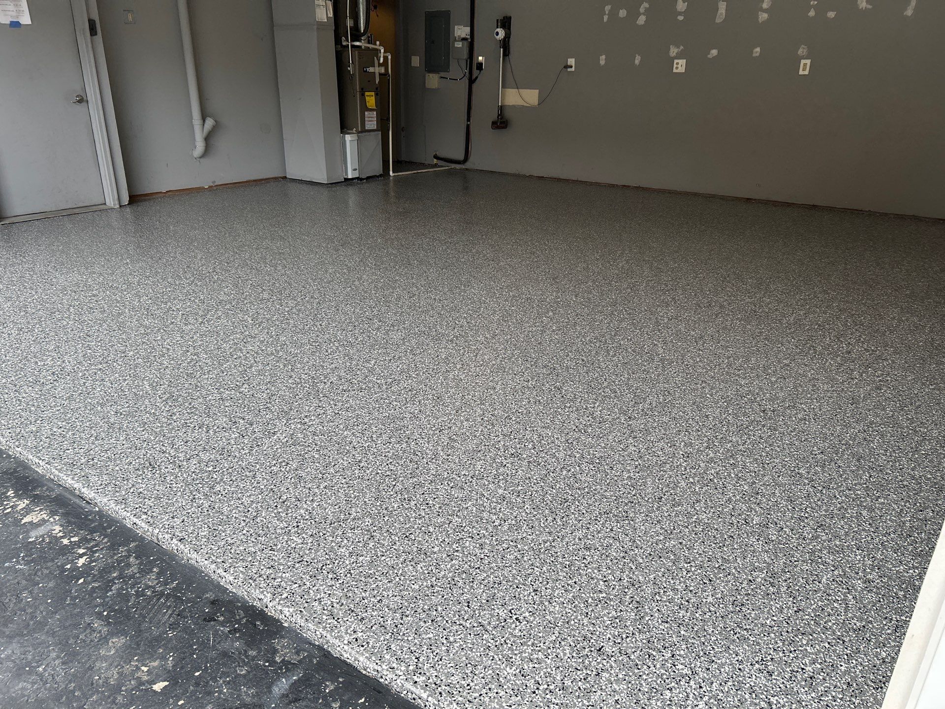 Smoke Concrete Coating in Elkhart! by Innovative Spaces / Innovative Concrete Coatings
