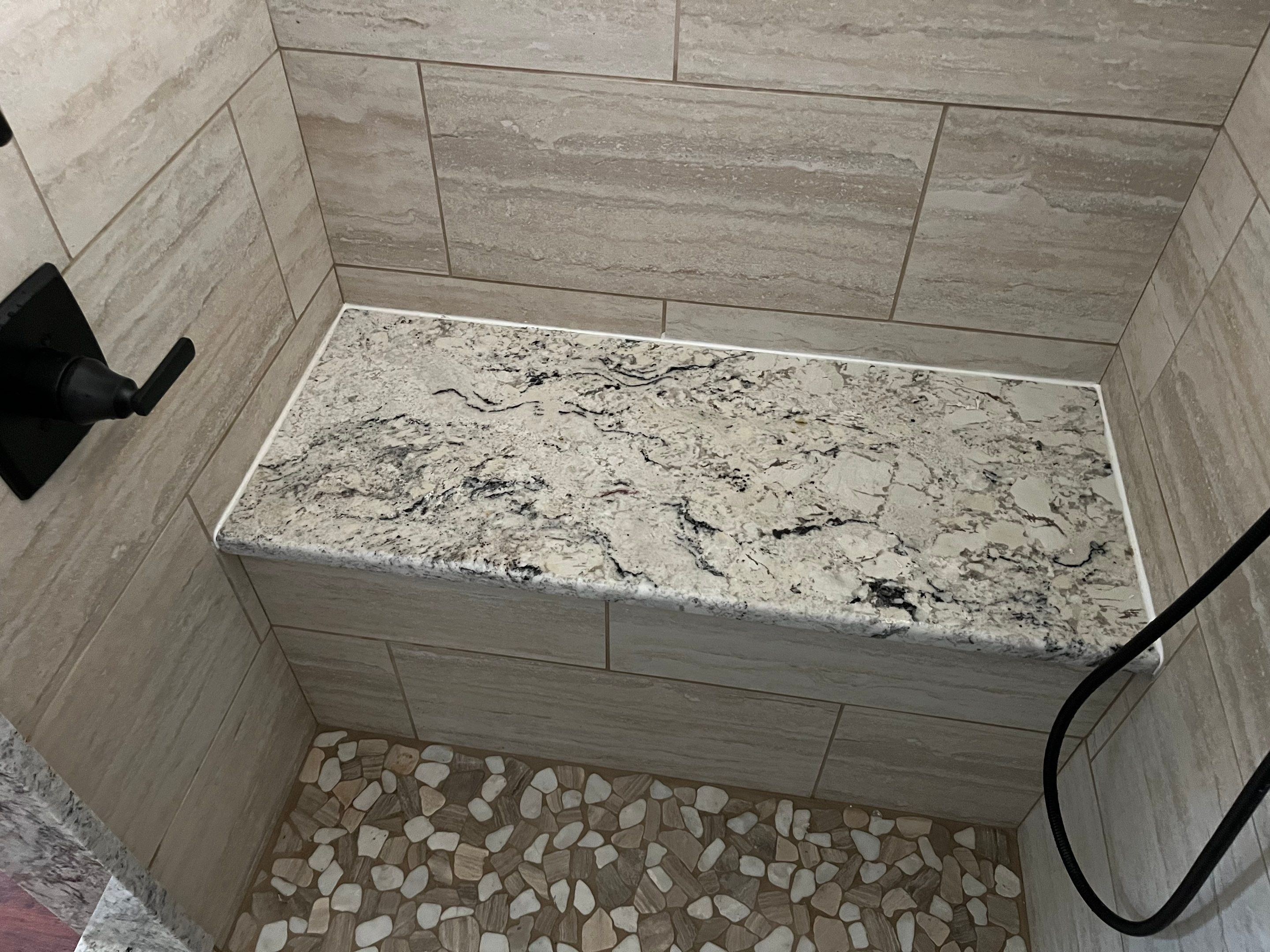 Bathroom Shower Remodel for a client by First United Roofing & Construction