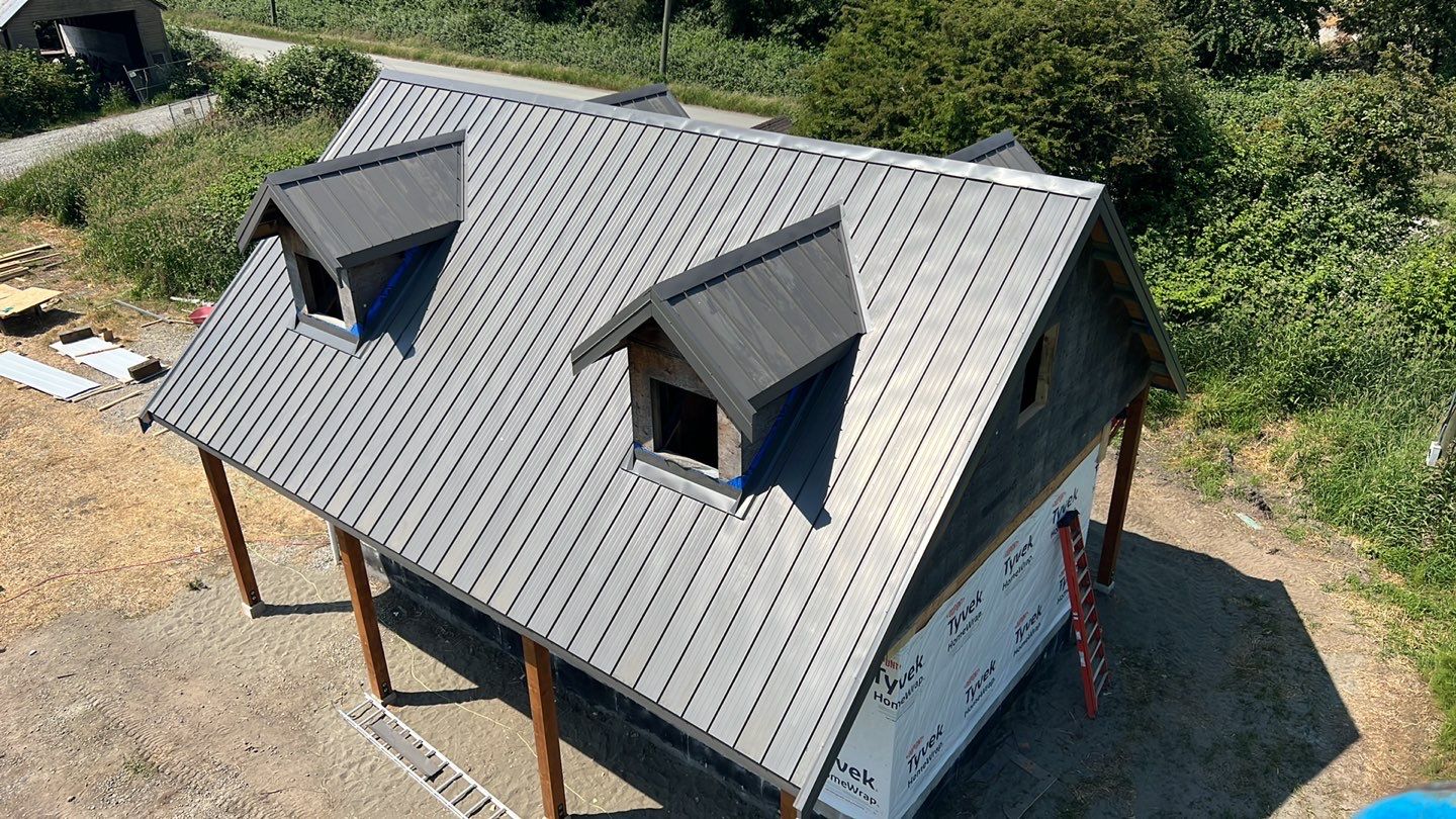 Agricultural Roofing Installation using 12" Prolok metal  by Top Notch Roofing Inc