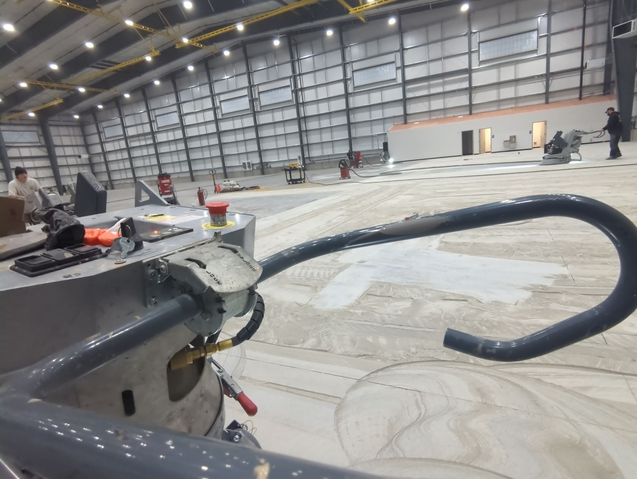Airplane Hanger using Light Grey Commercial Penntek Epoxy by Croc Coatings, LLC