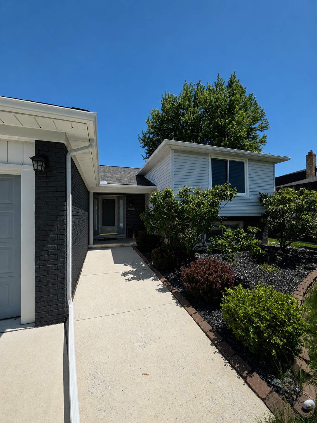 Modern Exterior Painting and Brick Staining in Sterling Heights by Top Shelf Painter
