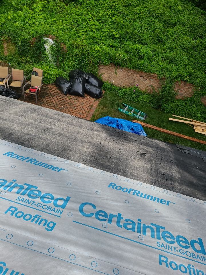 Springfield Tree Damage Restoration: CertainTeed Landmark Designer Shingles in Charcoal Black by RM Banning, Inc.