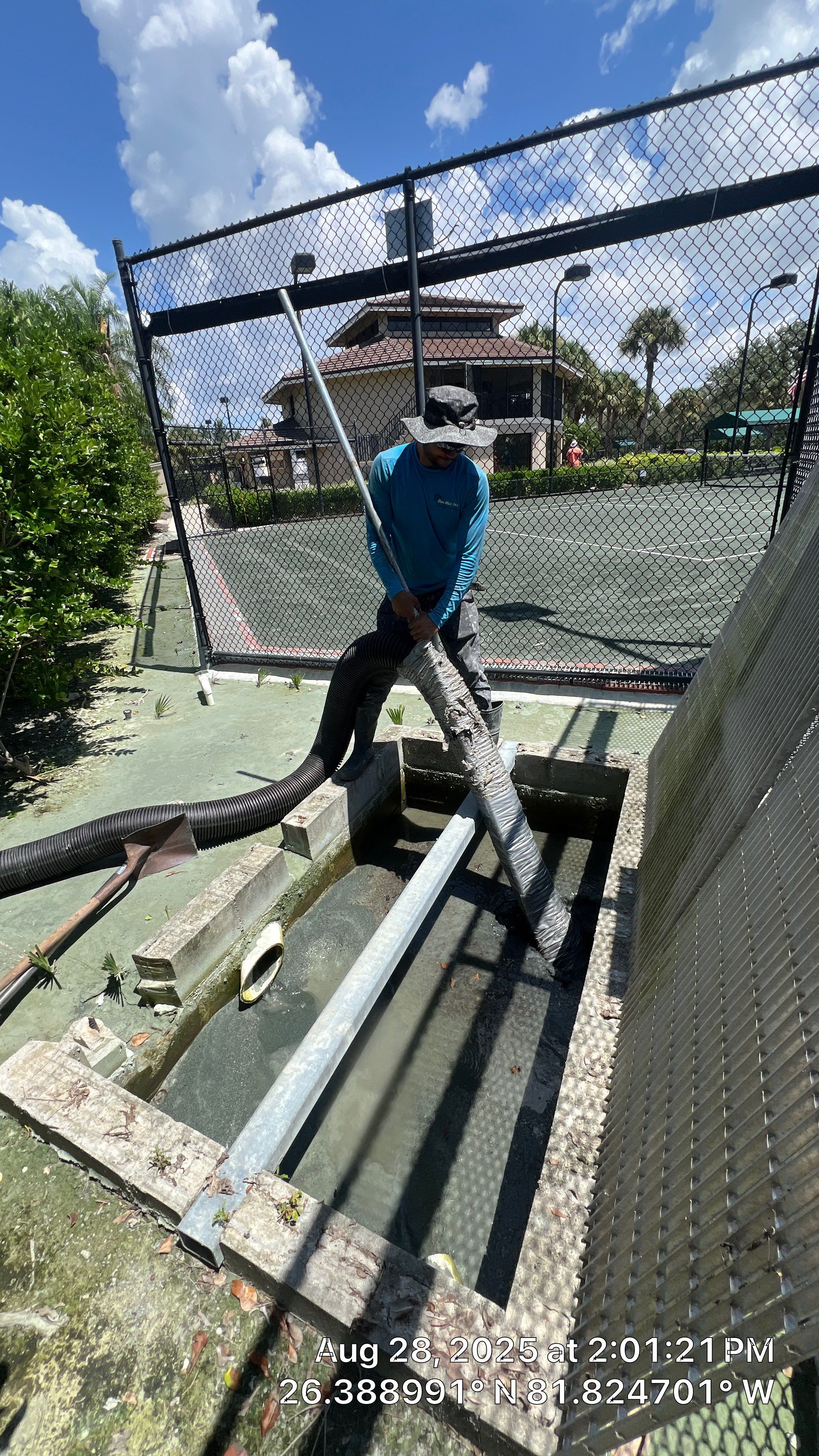 Pelican Landing Tennis Court Catch Basin Cleaning by Don Mar, Inc. Storm Water Solutions