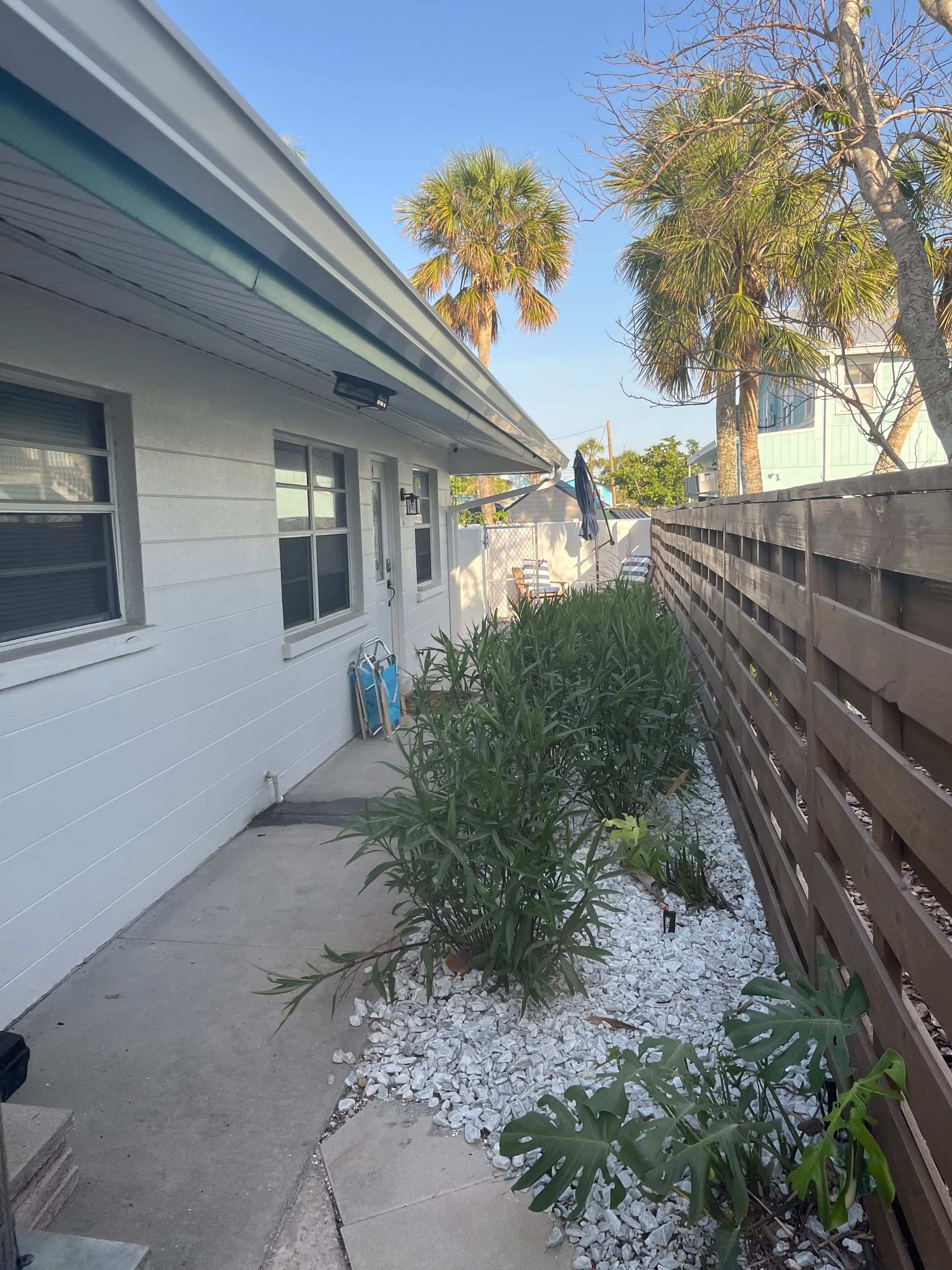 Splash Guard Gutter System and 7-inch Installation in Anna Maria FL by Gutter Professors