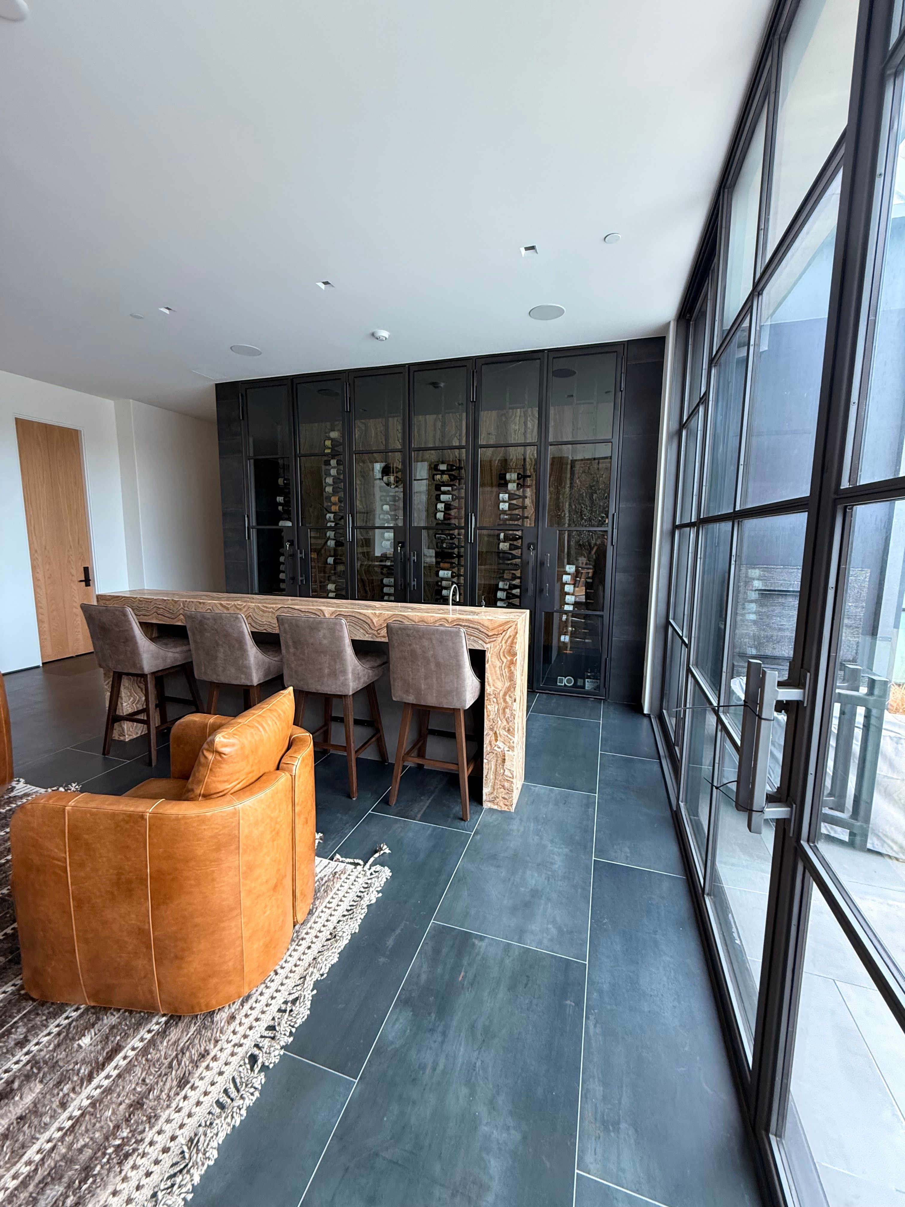 Custom Black-Framed Glass Wine Cellar Installation in Dallas by Solara Custom Living