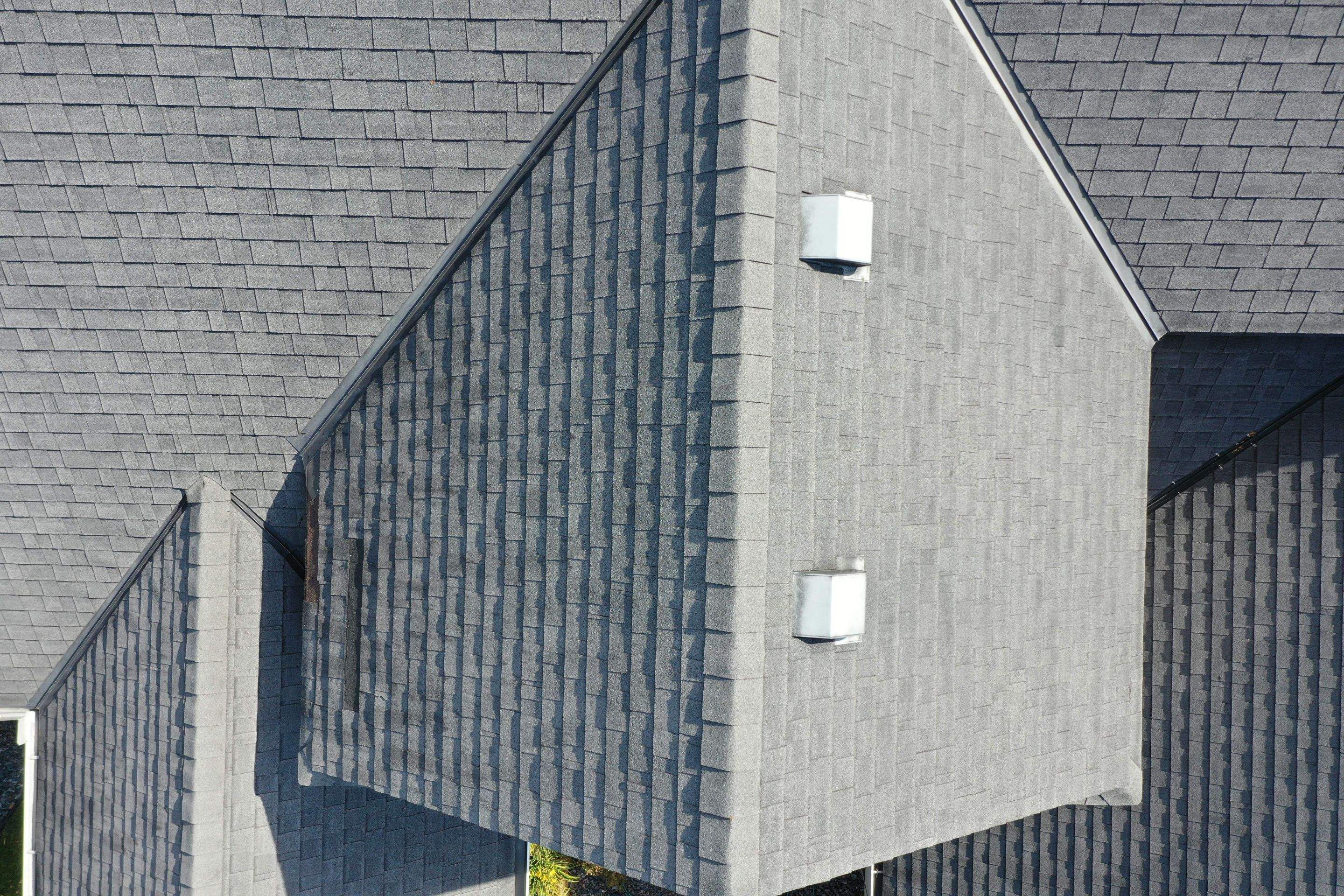 Residential Roofing Installation using Certainteed Landmark Moire Black by MODERN EXTERIOR SYSTEMS