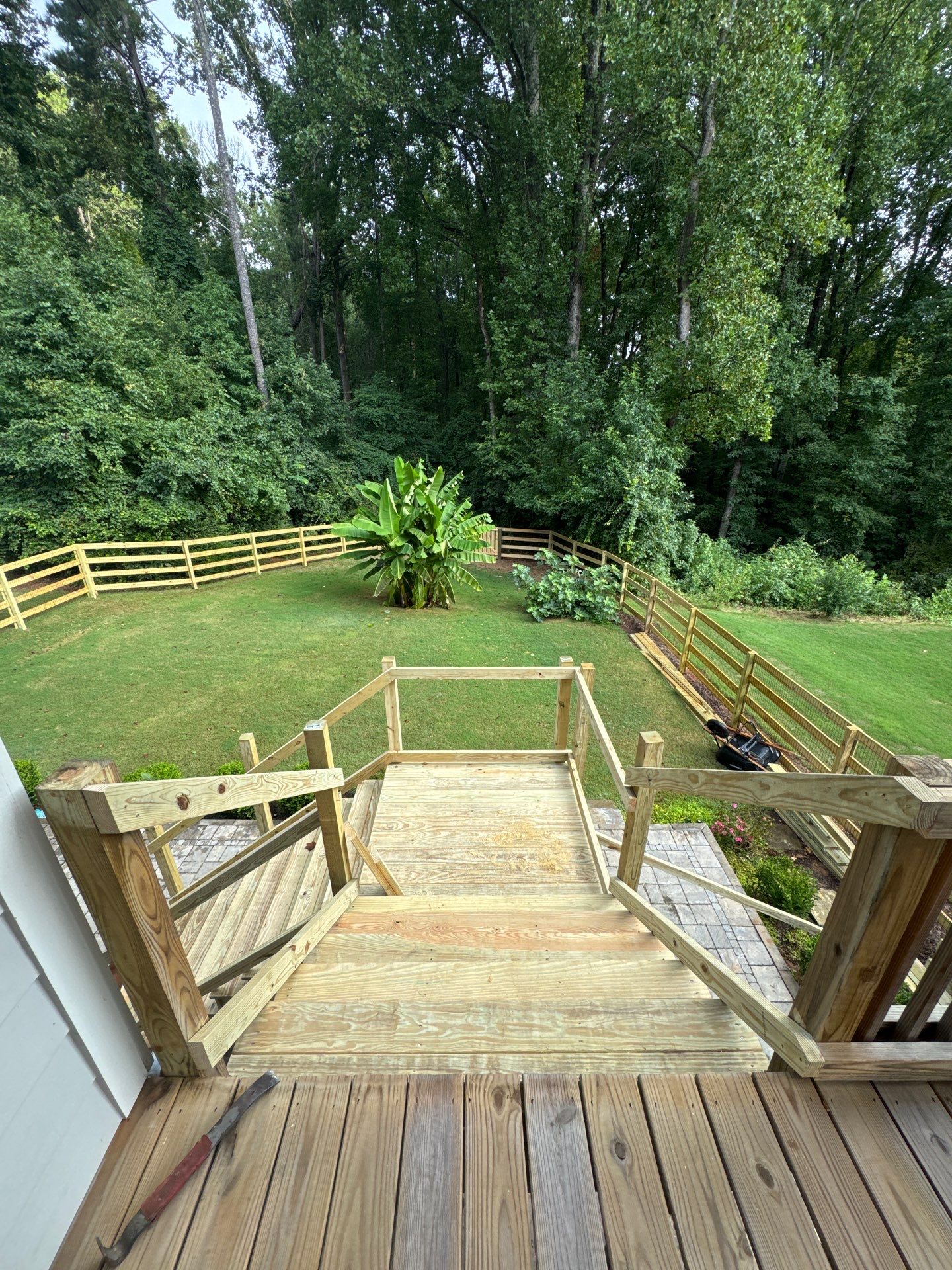 Elevated Deck Stair Construction and Paver Patio in Marietta by Swift Home Renovations