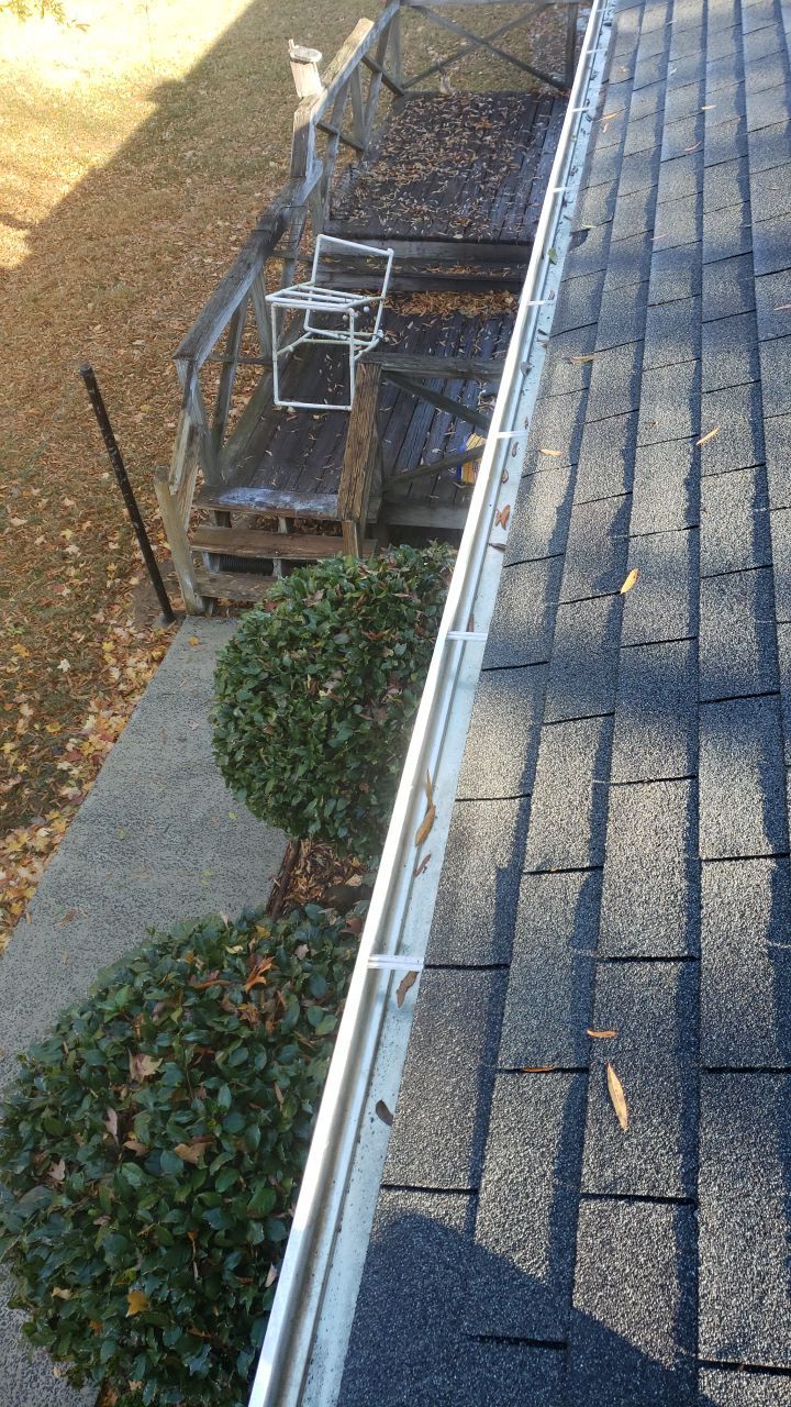 gutter cleaning and house wash and gutter guard installation by Power Wash Masters LLC
