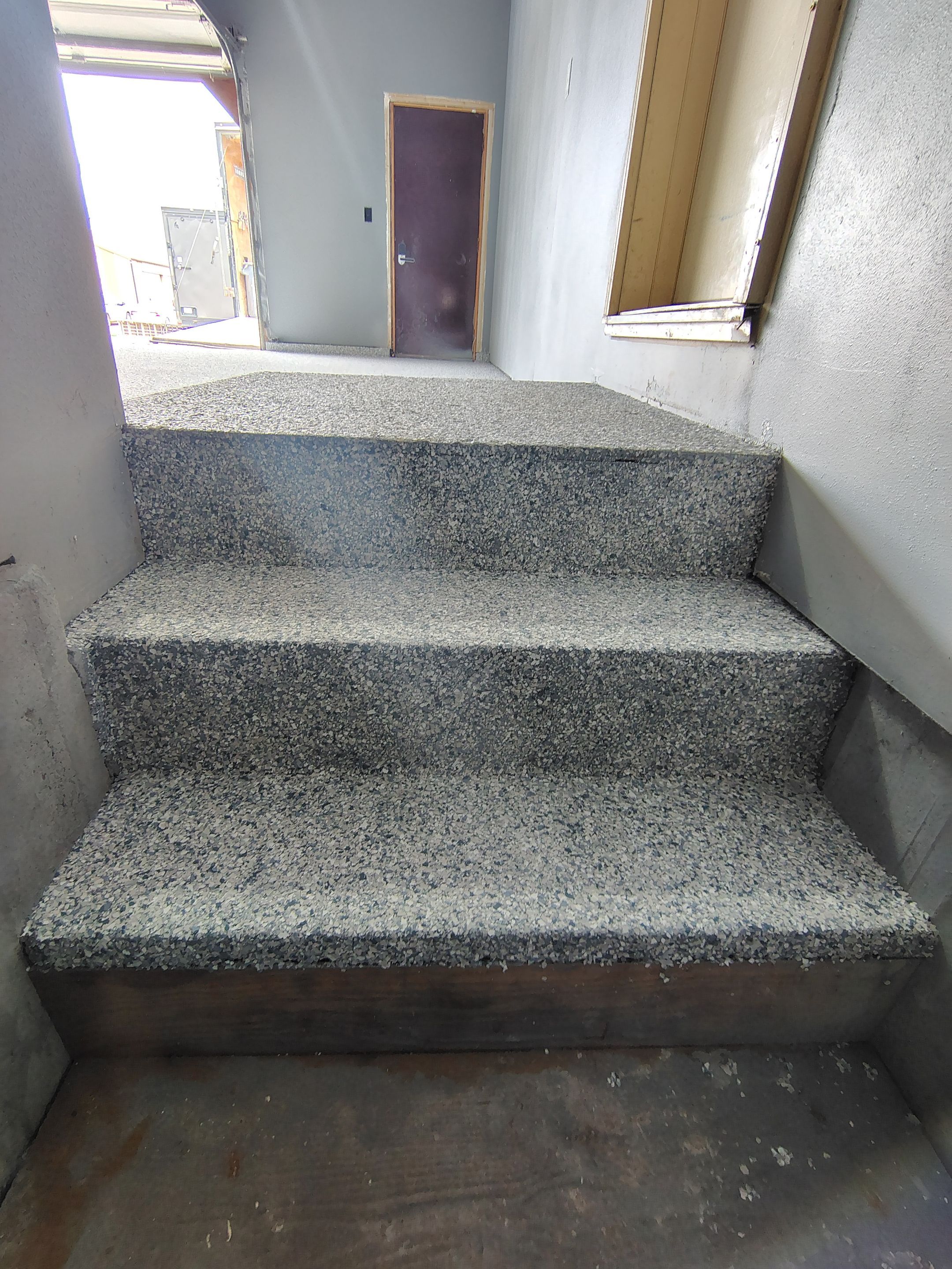 Garage Floor Concrete Coating and Surface Restoration in Colman by Select Painting, Coatings & Garage Cabinets