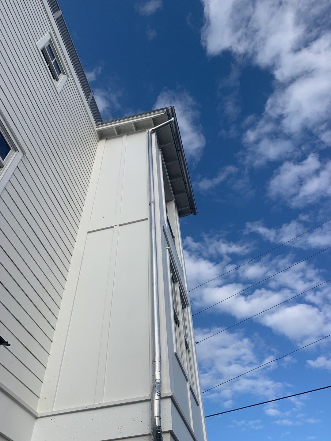 Half-Round Gutters in Galvalume Color in Santa Rosa Beach FL by Gutter Professors