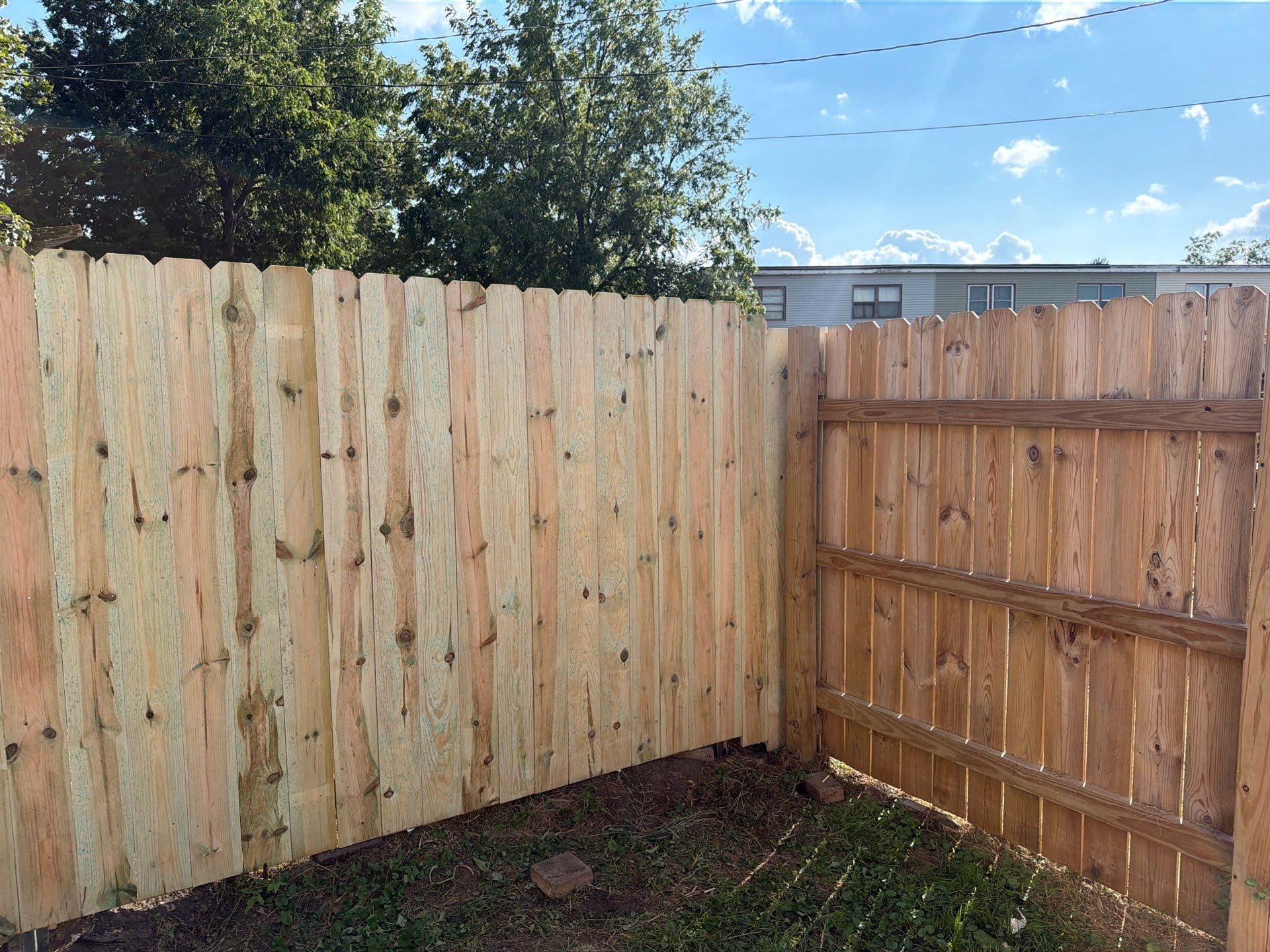 New Treated Wood Privacy Fence and Metal-Framed Gates by Perfect Picket Fence and Stain