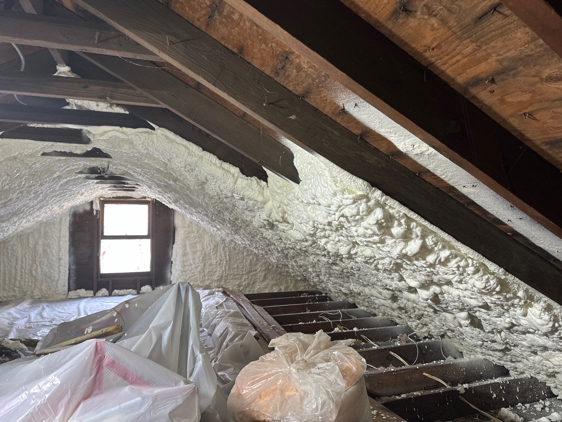 Attic Insulation using open cell spray foam by NYS Foam & Energy