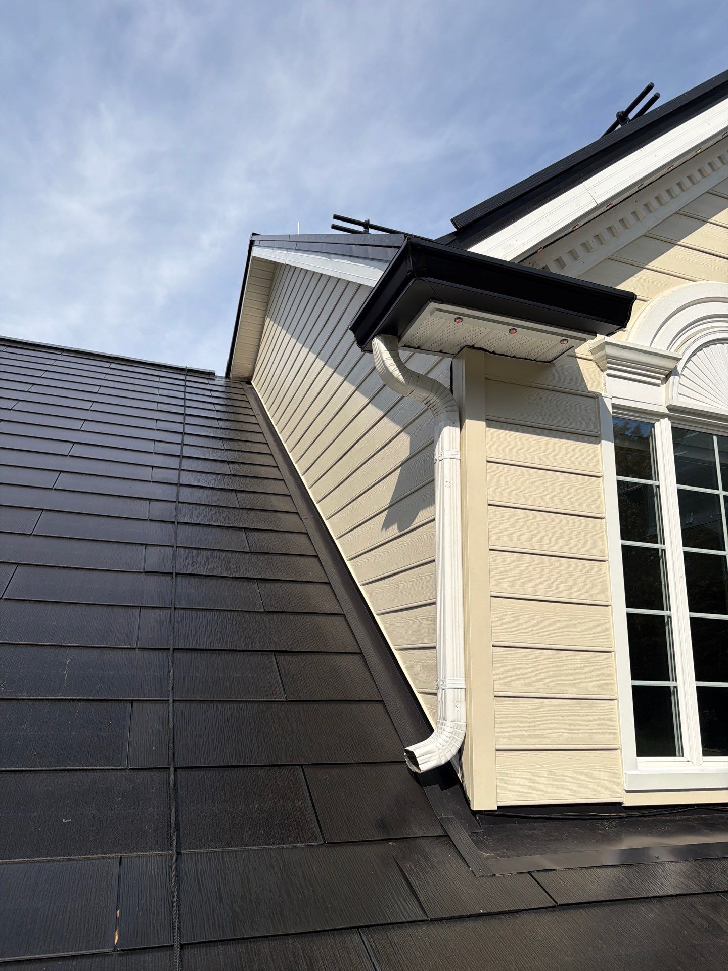 Beautiful James Hardie Siding & Tesla Solar Roof by American Home Contractors