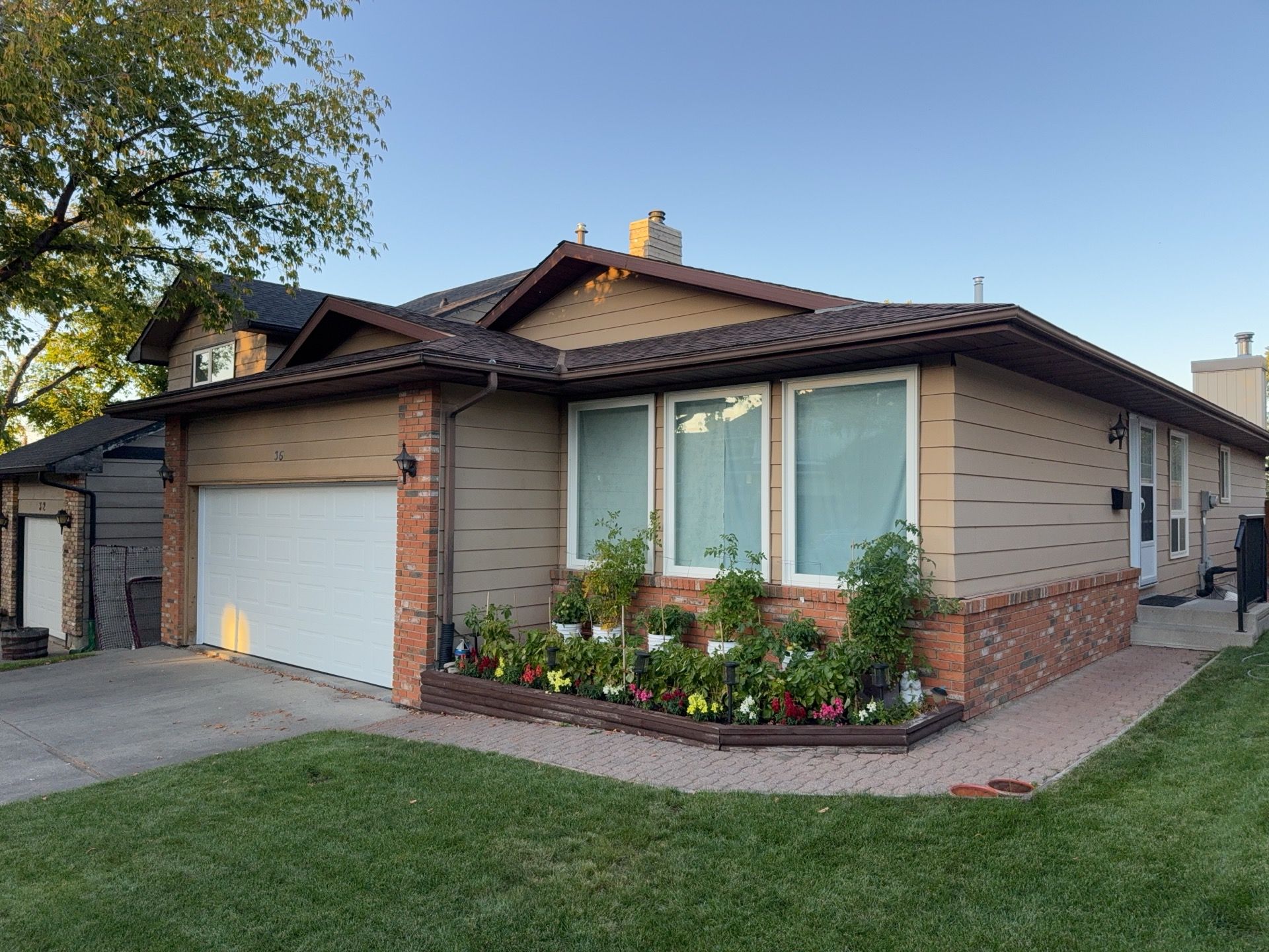 Calgary Chimney Chase Reconstruction and Exterior Siding Replacement by Smart Home Building Systems Ltd.
