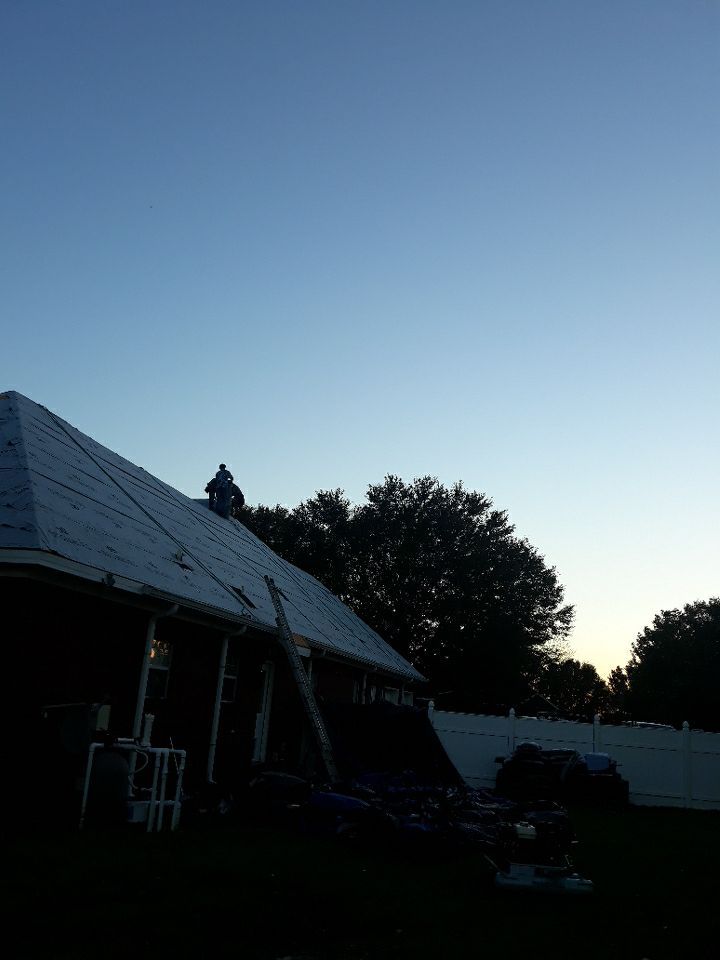 Residential Roofing Installation using Roof Replacement by American Roofing & Construction LLC