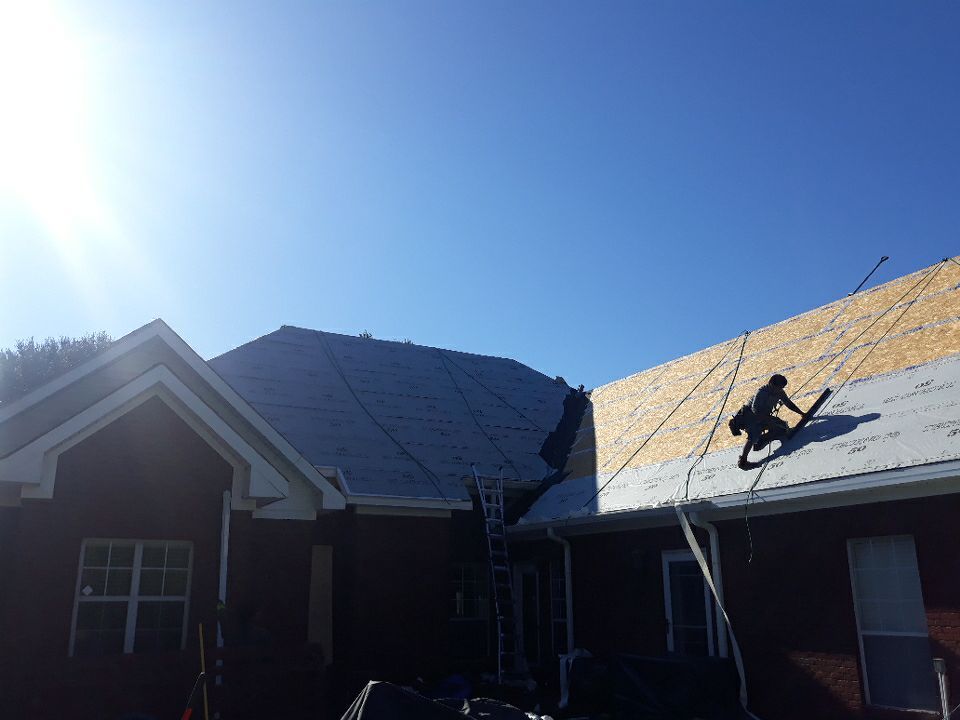 Residential Roofing Installation using Roof Replacement by American Roofing & Construction LLC
