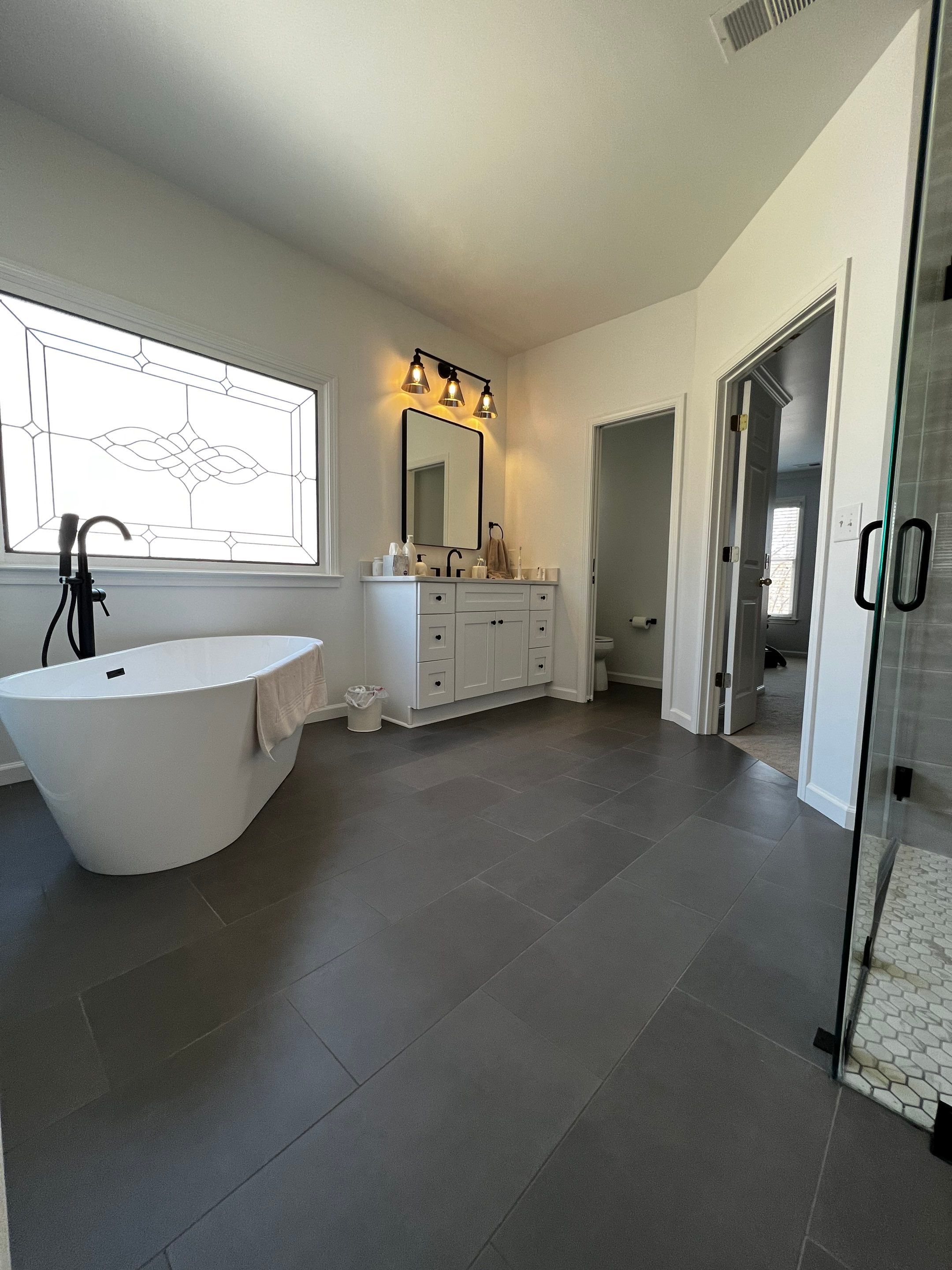 Modern Master Bathroom Remodel and Bedroom Painting in Woodstock by Swift Home Renovations
