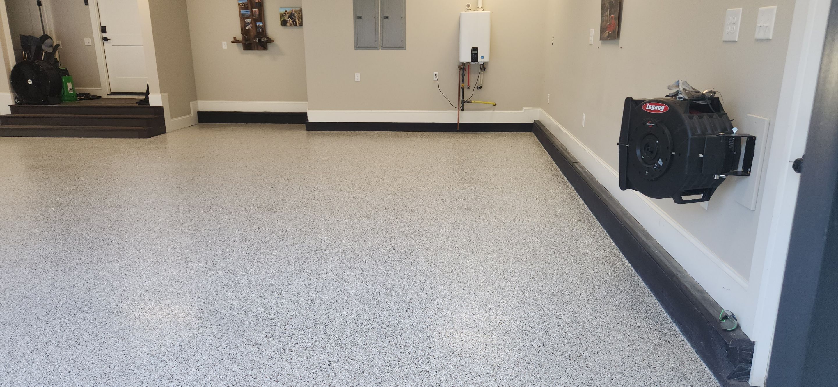 Front Porch and Garage using Coyote & Pumice by Elite Floor Solutions