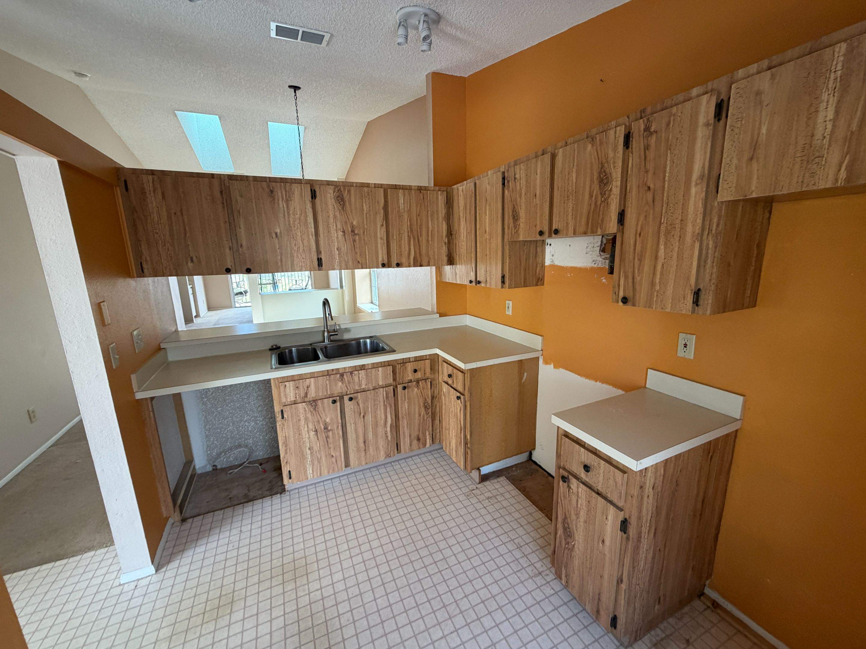 Treasure Island Interior Remodel Featuring Vaulted Ceilings and Custom Cabinetry by Vertical General Contracting
