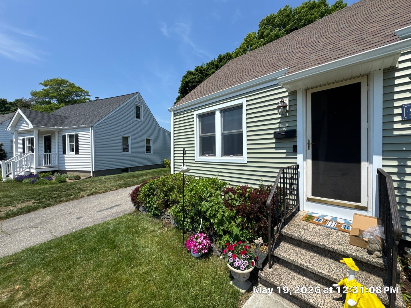New Vinyl Siding Installation for Milford Home and Detached Garage by A Plus Exterior