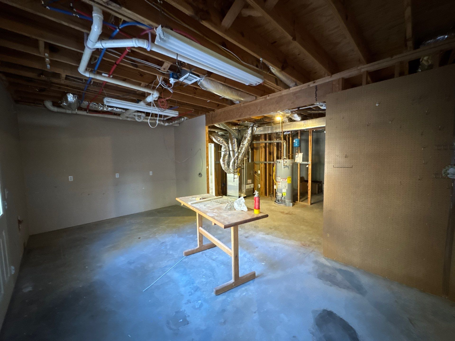 Full Basement Remodel in Powder Springs Featuring Custom Kitchenette by Swift Home Renovations