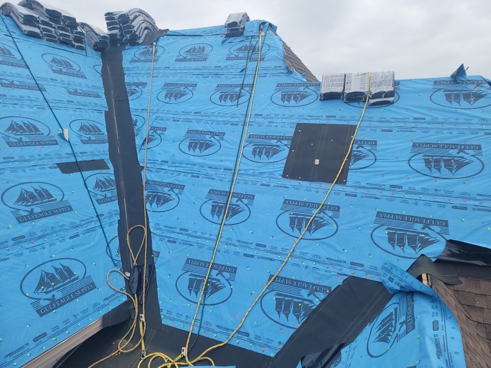 Residential Roofing Installation using Roof Replacement by American Roofing & Construction LLC