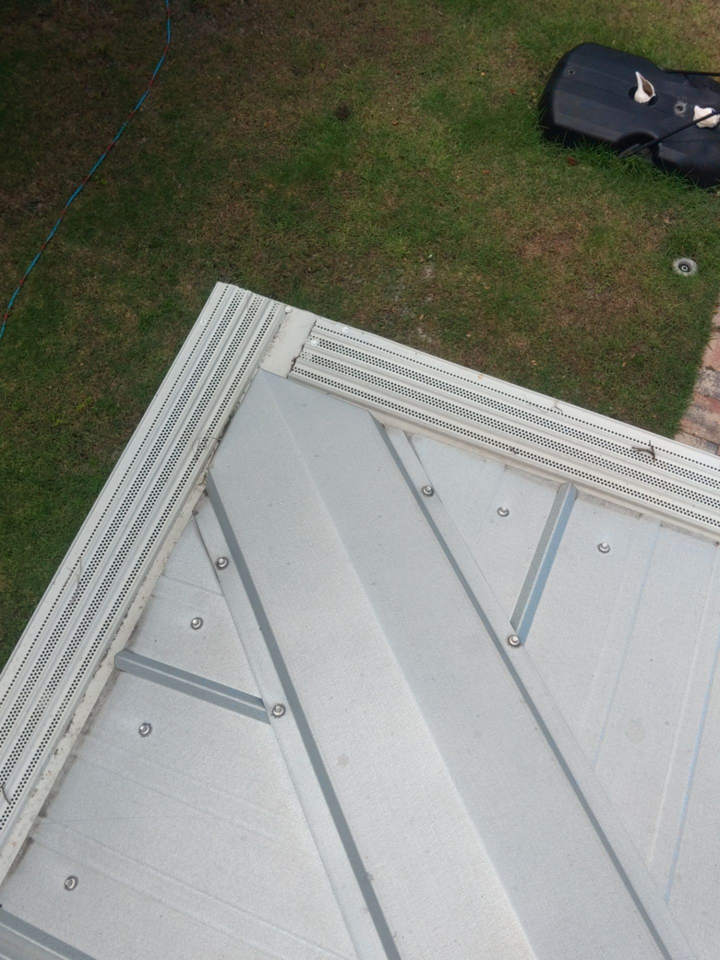 Gutter guards installation combined with gutter cleaning in Sarasota, FL by Gutter Professors