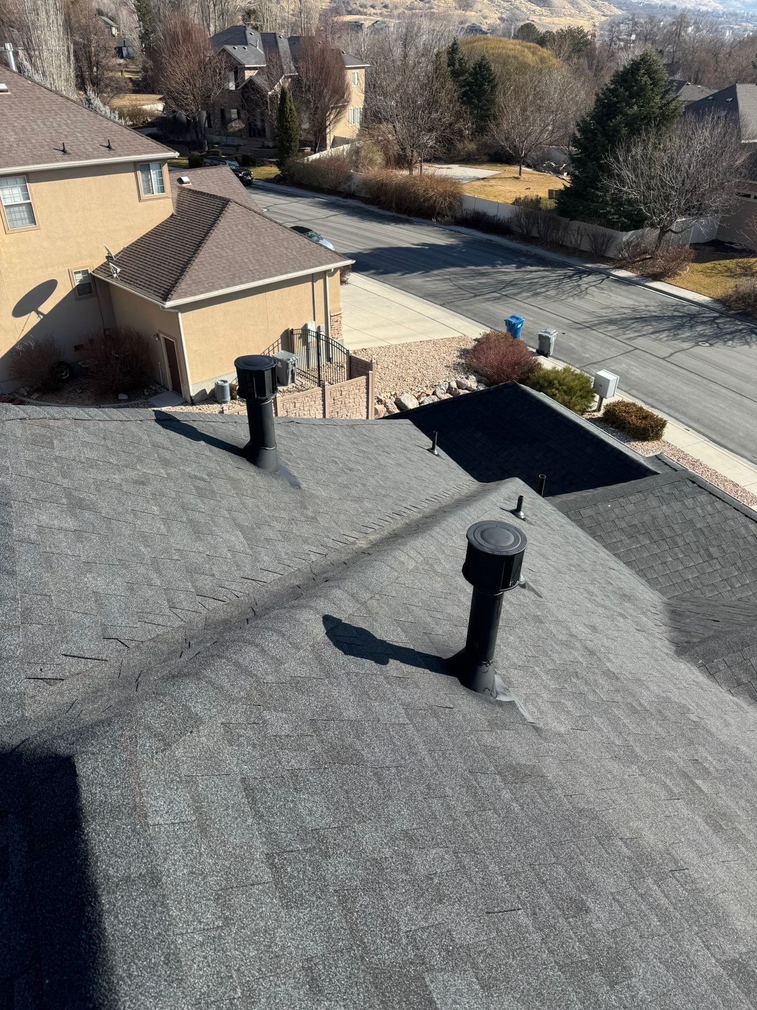 Charcoal Gray Shingles by Reimagine Roofing